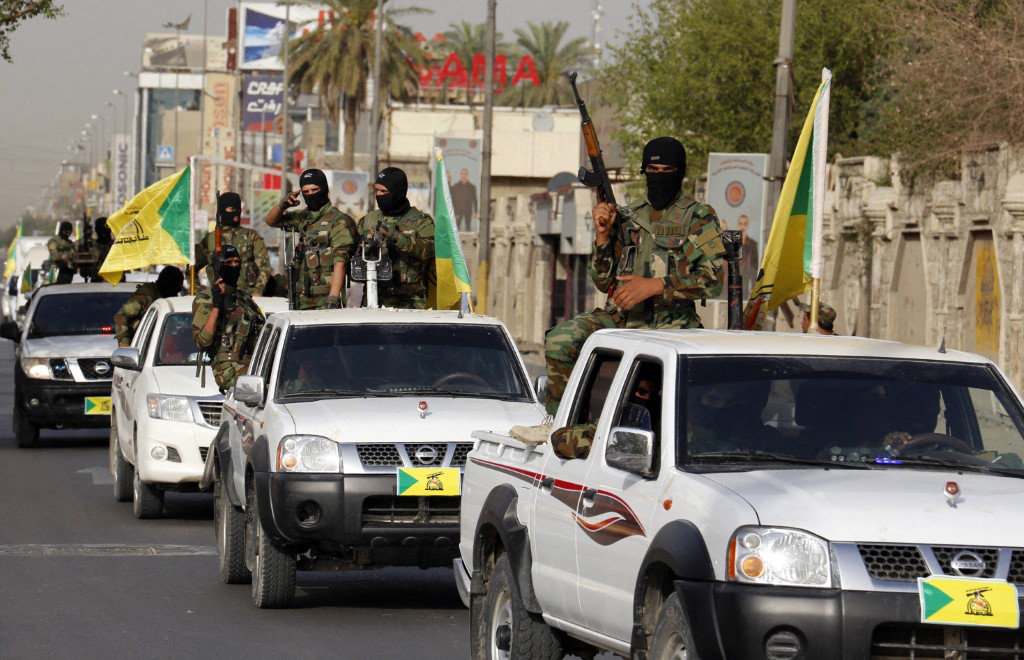 arabnews's tweet photo. #SPOTLIGHT: From Kataib Hezbollah to Asaib Ahl Al-Haq, Iran’s proxies have grown into powerful military &amp; political forces holding Iraq’s future hostage  https://t.co/MwcaKZLmsZ https://t.co/K974OnVTnZ