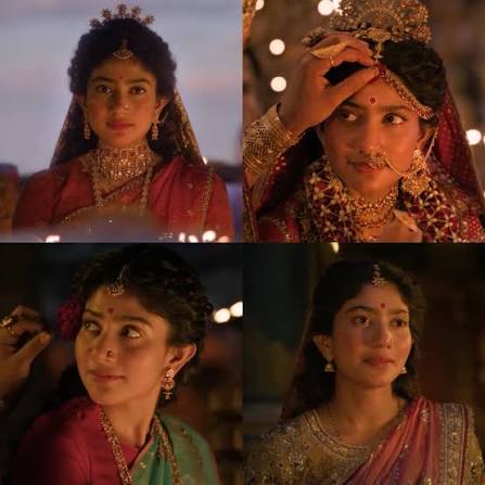 Aanvitha23's tweet photo. Sai Pallavi in Syam SInga Roy looks more divine and ethereal than in Ramayana...
Its not really about the skin show..Its everything about the presentation and conviction..
The high neck blouses and heavy blush is not it...
#Ramayana https://t.co/3JEobDepbr