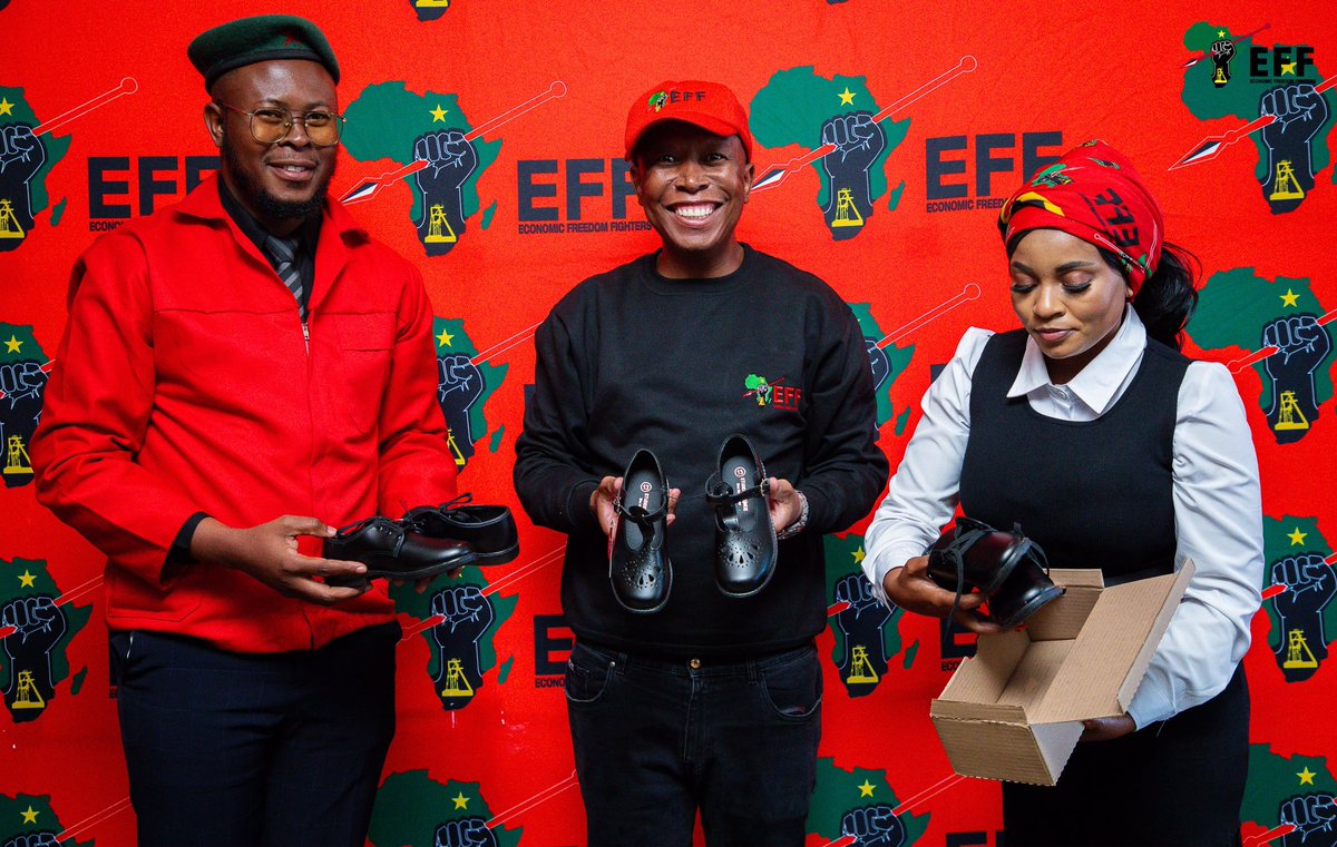 ApostleDeza's tweet photo. ♦️ IN PICTURES ♦️

Fighters are people of their word 👌❤️👏🏾

Fighter @MapulaMokgosang and @ApostleDeza today delivered shoes to the President and Commander-in-Chief Timpakgolo Julius Malema, on behalf of Fighters. The delivery included shoes for the CIC, as well as school shoes for young Fighters.

This is a promise and commitment we made after Grok claimed that the CIC was wearing a pair of shoes worth R800.

Thank you, Fighters! You are a true reflection of what the EFF stands for. We make commitments, and we deliver.

#EFFPresser