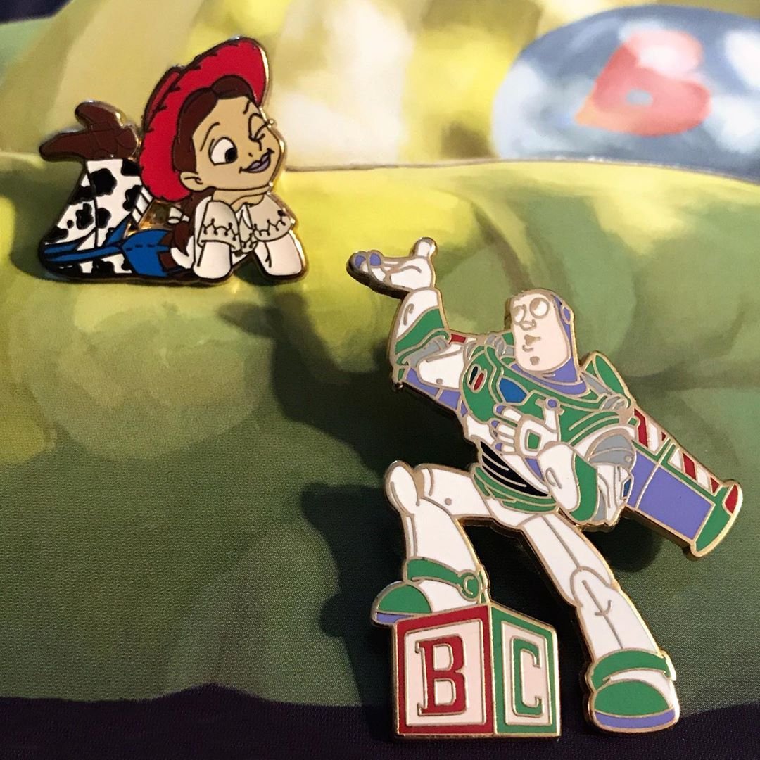 guessingdame's tweet photo. Buzz even dreams of Jessie this is creasing me 😭😭. Way too damn happy too. I love these Toy Story pins https://t.co/qZG3W50zN7
