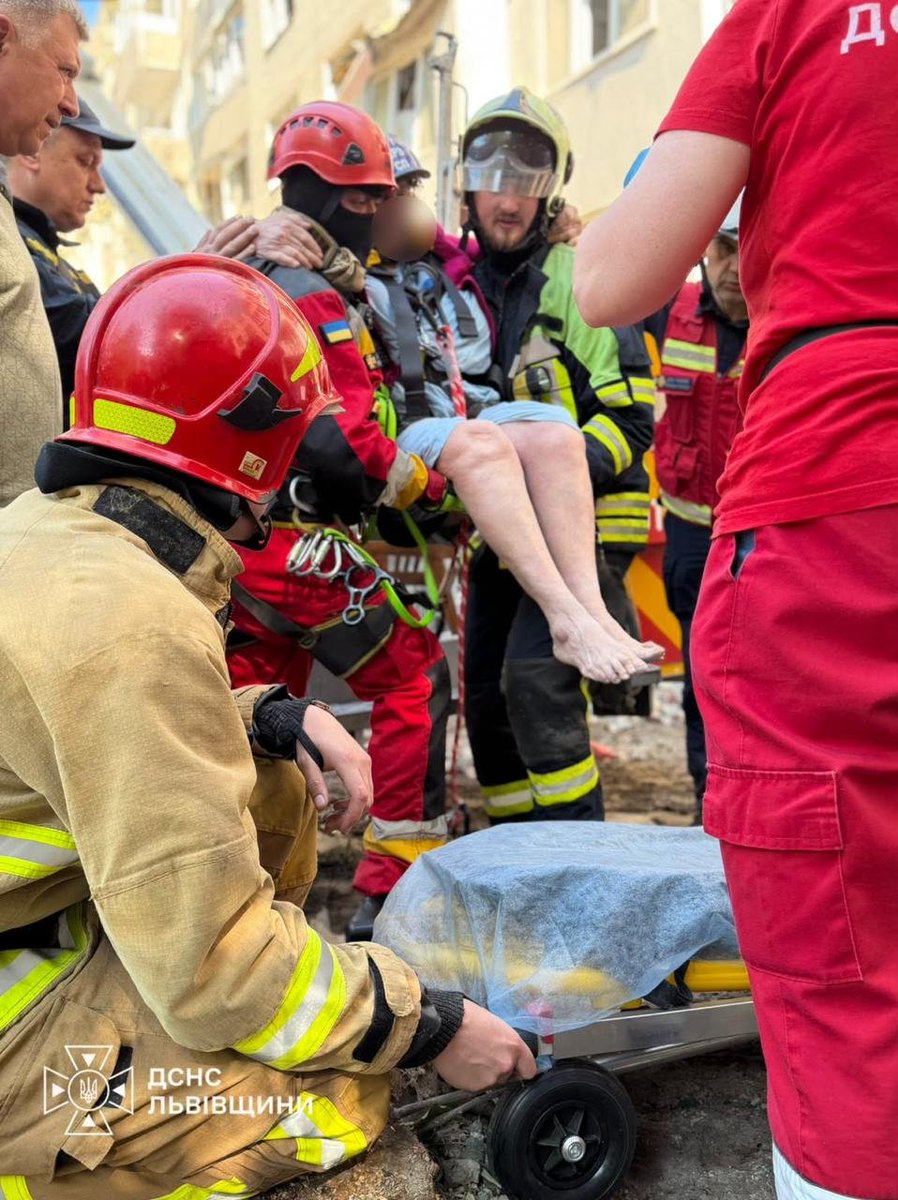 OlenaHalushka's tweet photo. First responders rescued and evacuated a 93yo woman. The russians bombed her home in Lviv, trapping her in the rubble of her apartment at the highest floor.

Don't look away, please. The russian terror continues every day. https://t.co/hSJYu59u0q