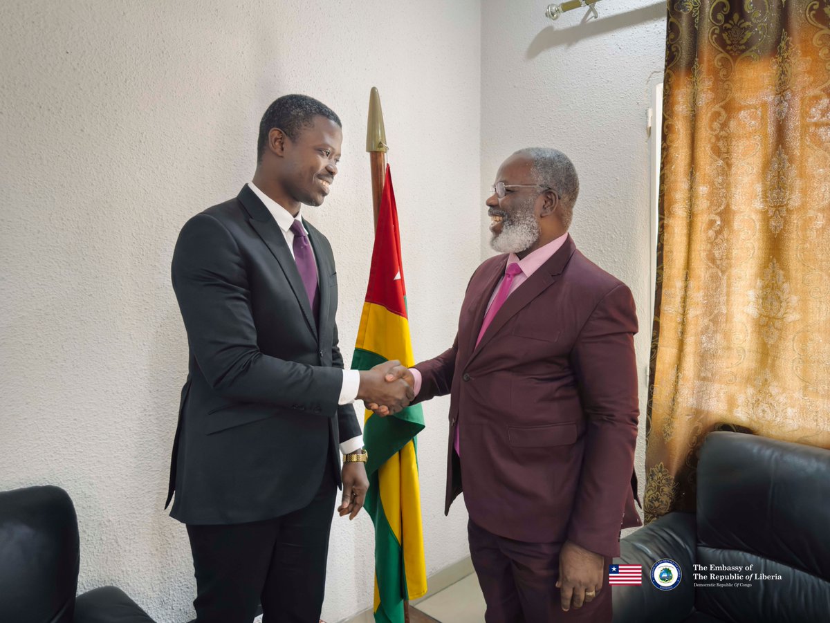 EmbLiberiaDRC's tweet photo. 🇱🇷🇹🇬 Poursuivant sa dynamique de concertation au sein du corps diplomatique accrédité en République Démocratique du Congo, l’Ambassade de la République du Libéria a effectué une visite de courtoisie à l’Ambassade de la République Togolaise à Kinshasa. À cette occasion, le Chef de Mission, Son Excellence Dr Da Monynson Tarr, a été chaleureusement reçu par Monsieur Mégnassan Akoli MENSAH, Chargé d'Affaires a.i.

Cette rencontre solennelle a permis de passer en revue les excellentes relations bilatérales qui unissent Monrovia et Lomé, tout en réaffirmant l'engagement commun des deux nations en faveur de la solidarité africaine, de la coopération inter-institutionnelle et de l'intégration sous-régionale en Afrique de l'Ouest.

L’Ambassade du Libéria adresse ses plus vifs remerciements à Monsieur Mégnassan Akoli MENSAH pour la qualité de son accueil, scellant ainsi une étape supplémentaire dans la consolidation des liens fraternels entre les deux missions à Kinshasa.
_____

🇱🇷🇹🇬 Continuing its active engagement within the diplomatic corps accredited to the Democratic Republic of the Congo, the Embassy of the Republic of Liberia paid a courtesy visit to the Embassy of the Togolese Republic in Kinshasa. On this occasion, the Head of Mission, H.E. Dr. Da Monynson Tarr, was warmly received by Mr. Mégnassan Akoli MENSAH, Chargé d'Affaires a.i.

This official meeting provided an opportunity to review the excellent bilateral ties uniting Monrovia and Lomé, while reaffirming both nations' shared commitment to African solidarity, institutional cooperation, and West African regional integration.

The Embassy of Liberia expresses its sincere appreciation to Mr. Mégnassan Akoli MENSAH for the gracious reception, marking another meaningful step toward strengthening fraternal bonds between the two missions in Kinshasa.

#Diplomacy #Liberia #Togo #Kinshasa #DRC #WestAfrica #BilateralRelations #NetworkDiplomacy #AfricanUnity