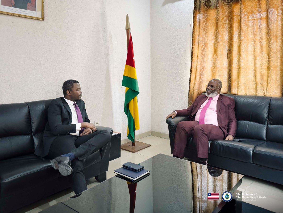 EmbLiberiaDRC's tweet photo. 🇱🇷🇹🇬 Poursuivant sa dynamique de concertation au sein du corps diplomatique accrédité en République Démocratique du Congo, l’Ambassade de la République du Libéria a effectué une visite de courtoisie à l’Ambassade de la République Togolaise à Kinshasa. À cette occasion, le Chef de Mission, Son Excellence Dr Da Monynson Tarr, a été chaleureusement reçu par Monsieur Mégnassan Akoli MENSAH, Chargé d'Affaires a.i.

Cette rencontre solennelle a permis de passer en revue les excellentes relations bilatérales qui unissent Monrovia et Lomé, tout en réaffirmant l'engagement commun des deux nations en faveur de la solidarité africaine, de la coopération inter-institutionnelle et de l'intégration sous-régionale en Afrique de l'Ouest.

L’Ambassade du Libéria adresse ses plus vifs remerciements à Monsieur Mégnassan Akoli MENSAH pour la qualité de son accueil, scellant ainsi une étape supplémentaire dans la consolidation des liens fraternels entre les deux missions à Kinshasa.
_____

🇱🇷🇹🇬 Continuing its active engagement within the diplomatic corps accredited to the Democratic Republic of the Congo, the Embassy of the Republic of Liberia paid a courtesy visit to the Embassy of the Togolese Republic in Kinshasa. On this occasion, the Head of Mission, H.E. Dr. Da Monynson Tarr, was warmly received by Mr. Mégnassan Akoli MENSAH, Chargé d'Affaires a.i.

This official meeting provided an opportunity to review the excellent bilateral ties uniting Monrovia and Lomé, while reaffirming both nations' shared commitment to African solidarity, institutional cooperation, and West African regional integration.

The Embassy of Liberia expresses its sincere appreciation to Mr. Mégnassan Akoli MENSAH for the gracious reception, marking another meaningful step toward strengthening fraternal bonds between the two missions in Kinshasa.

#Diplomacy #Liberia #Togo #Kinshasa #DRC #WestAfrica #BilateralRelations #NetworkDiplomacy #AfricanUnity