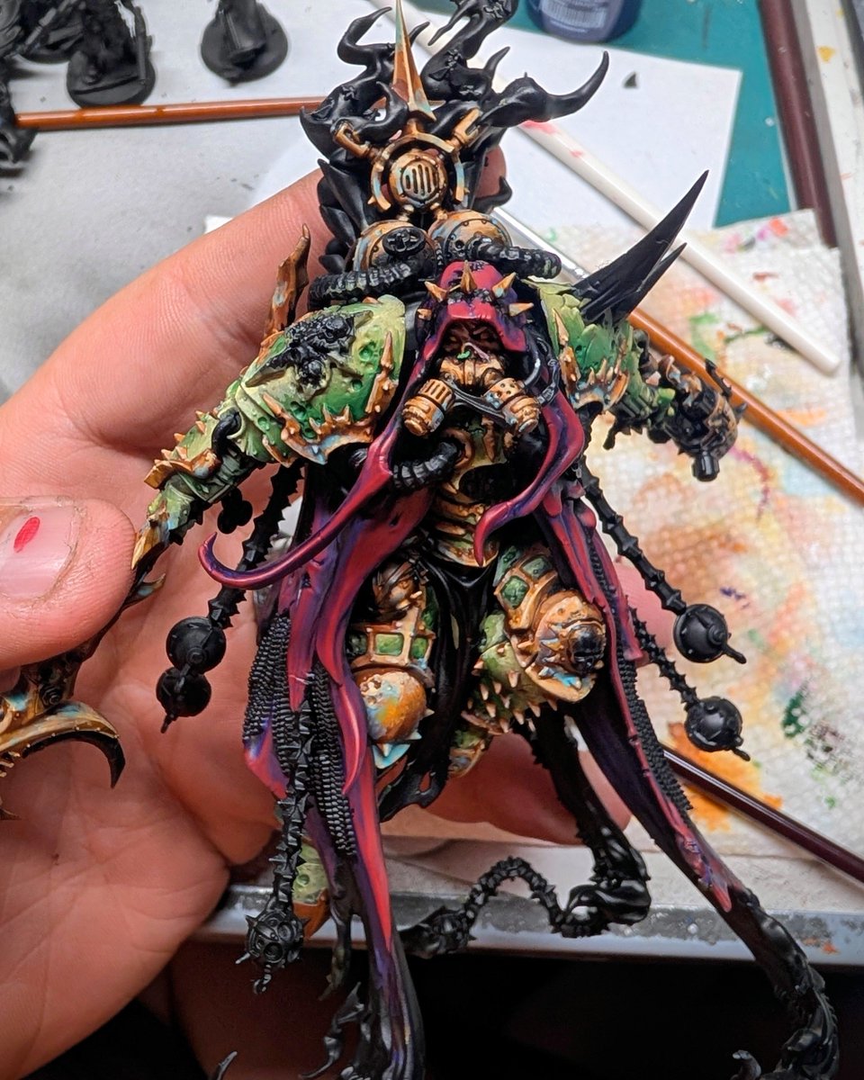 DavidStacy410's tweet photo. Alright after repainting twice I've settled in reddish purple cloth for this monstrosity. 

So much detail on this model 😭 https://t.co/9Mmb8qMKrh