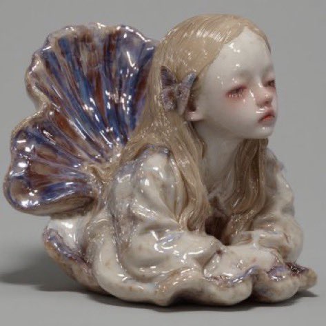 gentleescape's tweet photo. pretty siren figurine https://t.co/1dG3NaW47s