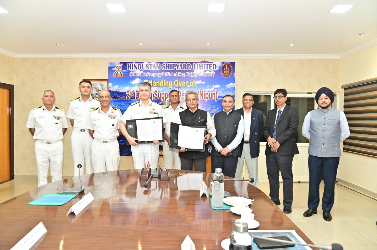 CMD_HSL's tweet photo. India's underwater strategic capability and maritime preparedness received a significant boost today as HSL delivered 𝐍𝐢𝐩𝐮𝐧, the Diving Support Vessel (DSV), to the Indian Navy.
Coming just a year after the successful delivery of 𝐈𝐍𝐒 𝐍𝐢𝐬𝐭𝐚𝐫, 𝐍𝐢𝐩𝐮𝐧 underscores HSL's proven expertise in building complex strategic platforms of national importance and reinforces India's growing strength in indigenous defence shipbuilding.
The Acceptance Document (D448) was signed by 𝐑𝐞𝐚𝐫 𝐀𝐝𝐦𝐢𝐫𝐚𝐥 𝐀𝐫𝐯𝐢𝐧𝐝 𝐑𝐚𝐰𝐚𝐥, 𝐕𝐒𝐌, 𝐂𝐒𝐎 (𝐓𝐞𝐜𝐡), 𝐖𝐞𝐬𝐭𝐞𝐫𝐧 𝐍𝐚𝐯𝐚𝐥 𝐂𝐨𝐦𝐦𝐚𝐧𝐝 𝐚𝐧𝐝 𝐂𝐡𝐚𝐢𝐫𝐦𝐚𝐧, 𝐃𝟒𝟒𝟖 𝐂𝐨𝐦𝐦𝐢𝐭𝐭𝐞𝐞, 𝐚𝐧𝐝 𝐑𝐞𝐚𝐫 𝐀𝐝𝐦𝐢𝐫𝐚𝐥 𝐂𝐡𝐚𝐧𝐝𝐫𝐚𝐬𝐞𝐤𝐡𝐚𝐫𝐚𝐧 𝐑𝐚𝐠𝐡𝐮𝐫𝐚𝐦, 𝐕𝐒𝐌 (𝐑𝐞𝐭𝐝.), 𝐂𝐡𝐚𝐢𝐫𝐦𝐚𝐧 & 𝐌𝐚𝐧𝐚𝐠𝐢𝐧𝐠 𝐃𝐢𝐫𝐞𝐜𝐭𝐨𝐫, 𝐇𝐒𝐋.
𝐍𝐢𝐩𝐮𝐧 stands as a powerful symbol of the shared vision of the Government of India, the Indian Navy, and HSL to advance Aatmanirbhar Bharat through indigenous defence shipbuilding.