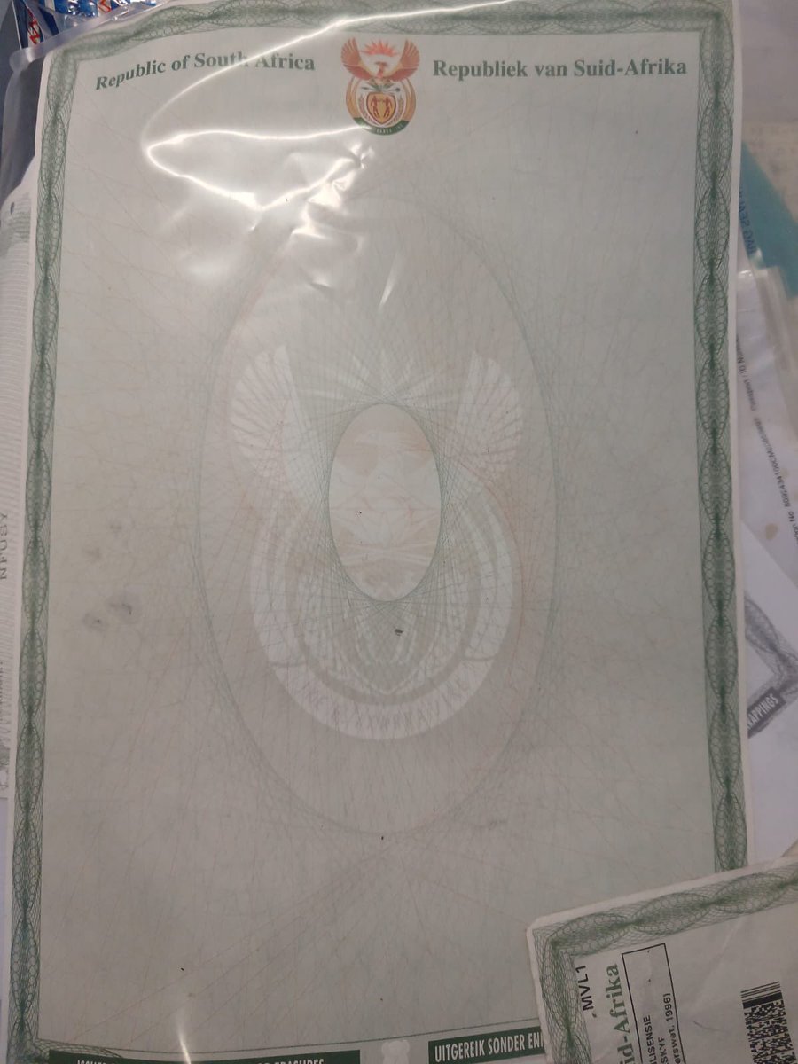 Abramjee's tweet photo. A joint operation between Maitland SAPS and the Border Management Authority has resulted in the arrest of a 56-year-old man in Cape Town
for manufacturing and selling fraudulent South African documents.

During a search of the suspect’s residence, authorities seized technology equipment believed to have been used to produce fake documents, as well as counterfeit South African passports, fraudulent entry visas, various official stamps, and blank document templates bearing the South African Coat of Arms.

The suspect was arrested on charges of forgery, uttering, and contravening the Immigration Act. 

He is expected to appear in the Cape Town Magistrate’s Court, where the case will proceed. 

Police say the operation forms part of ongoing efforts to combat document fraud and immigration-related crimes.