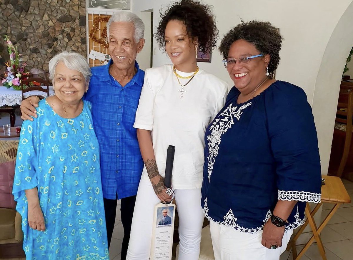 phuckerih's tweet photo. Prime minister Mia Mottley shares precious photo of Rihanna, Sir Garry, His wife and herself.

 “With Sir Garry's passing, The Right Excellent Robyn Rihanna Fenty now stands as our only living National Hero. The mantle upon her shoulders carries the weight” See full caption below https://t.co/c1Q7mKLqFn