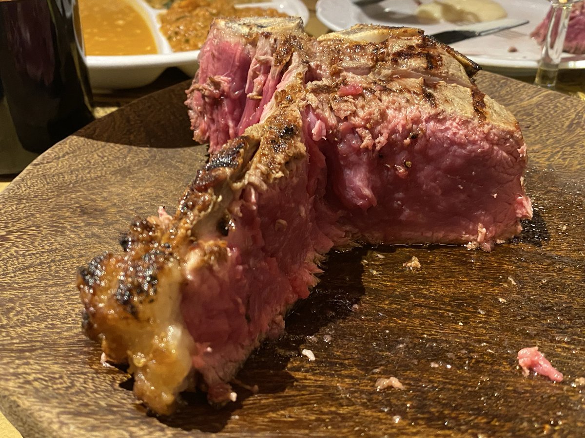 architectureYK's tweet photo. Tomorrow I’ll have time in a train to write smth but tonight I already imagine the taste of a good fiorentina from my favourite restaurant in Florence melting on my tongue. I know this restaurant for a long time. And when I lived in Bologna I used to take a train (less than 40 minutes & you are at Santa Maria Novella) to have lunch in this restaurant. In 2024 my daughter & her husband gifted me a trip to Florence as a bd present. We met there & had wonderful time between a fiorentina & the Capella Medicea. Btw, is that copyright office I don’t remember the name of getting ready for my infringing at IMAX where I’ll be watching the Odyssey? Warm up, guys! Warm up! I’m coming. 
————
July 22, 2024. With my kids at my favourite restaurant in Florence (‘cause my daughters’ husbands are my kids automatically, too).