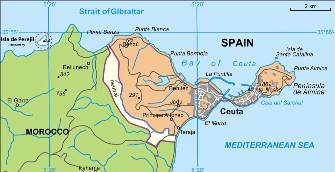 InsiderGeo's tweet photo. 🇪🇸 For everyone trying to understand what happened in Spain today, here's the situation:

The events are centered around Ceuta, a Spanish autonomous city located on the north coast of Africa, bordering Morocco. 

Together with Melilla, Ceuta is one of only two land borders between the European Union and Africa. Although geographically in Africa, Ceuta is sovereign Spanish territory and therefore part of the EU's external border.

Because of its location, Ceuta has long been one of the main entry points for migrants seeking to reach Europe. The city is protected by border fences, surveillance systems, and a permanent presence of Spain's Guardia Civil and National Police.

Today, the situation escalated dramatically.

According to Spanish authorities 
between 2,000 and 3,000 migrants crossed or attempted to cross into Ceuta in just a few hours. Hundreds entered by swimming around the Tarajal breakwater, using inflatable inner tubes and other flotation devices, while others reportedly forced their way through sections of the border.

The scale of the crossings overwhelmed the Guardia Civil, prompting the regional government of Ceuta to request immediate military assistance from Madrid, in response, the Spanish government activated emergency measures.

The Interior Ministry announced the deployment of Army units to reinforce the Guardia Civil, together with additional police officers, military divers, and a naval vessel to help secure the coastline and restore control over the border.

Prime Minister Pedro Sánchez is expected to travel to Ceuta, while authorities have stated that migrants who entered illegally will be processed under Spanish law, with deportations where legally applicable.

The humanitarian situation has also deteriorated.

According to police sources, 10 people lost their lives while attempting to swim into Ceuta. Emergency services have been conducting rescue operations throughout the day as crossings continued.

Residents have reported an atmosphere of uncertainty. Some businesses closed their doors early, with shop owners saying they feared possible disturbances and wanted to protect their families and property while security forces focused on the border.

The situation has also created diplomatic tensions inside Europe: Italian officials criticized Spain's migration policies and suggested that Schengen free movement with Spain should be suspended, arguing that Madrid's regularization policies could encourage further irregular migration. Spain strongly rejected those remarks, with Foreign Minister José Manuel Albares summoning the Italian ambassador and accusing Rome of responding with political rhetoric instead of European solidarity.

At the same time, Spanish authorities temporarily closed the Melilla border crossing after further attempts by migrants to enter through Spain's second enclave in North Africa.

On the Moroccan side of the border, security forces have deployed riot police, tear gas, and water cannons in an effort to disperse thousands of people gathered near Ceuta, while reports indicate that large groups continue to move toward the border.

The European Union has already expressed its willingness to assist Spain, including through Frontex, as Madrid works to regain control of the situation.

This is the most serious migration crisis affecting Ceuta since 2021, when around 10,000 people entered the enclave within days.
