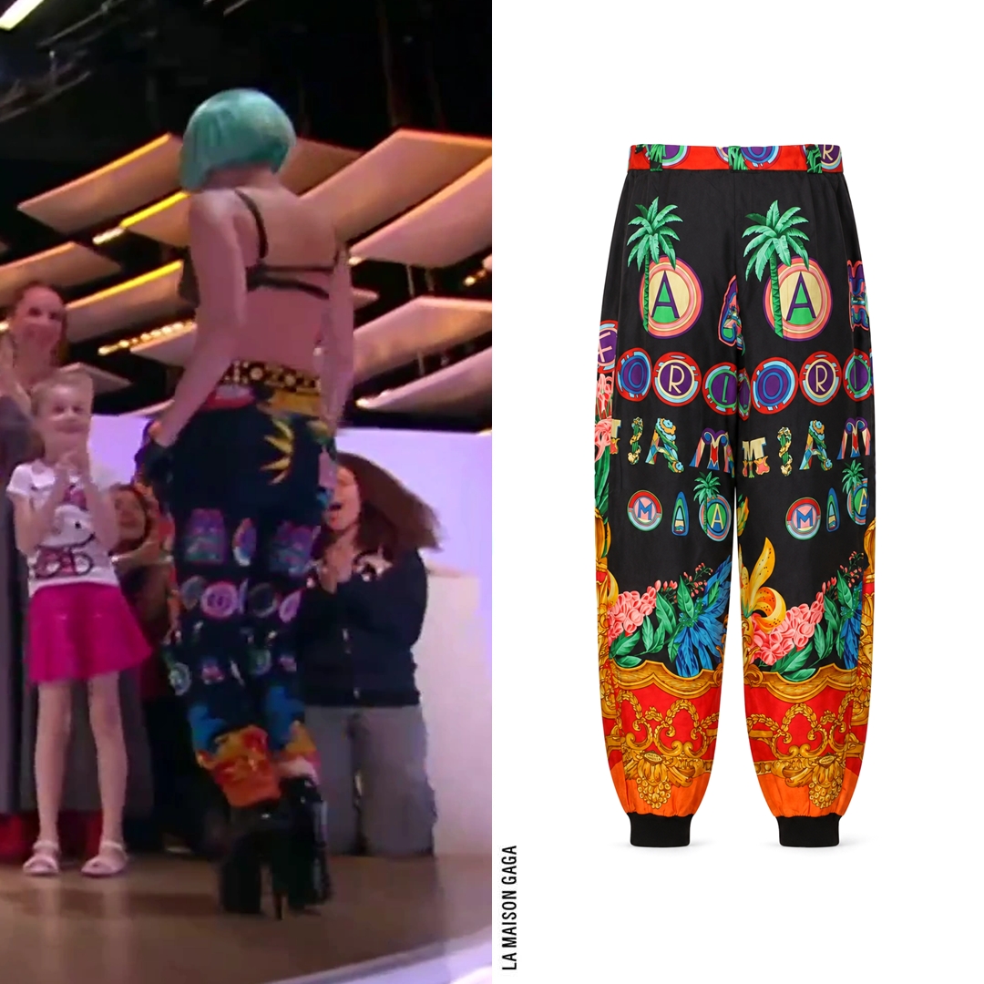 LaMaisonGaga_'s tweet photo. Look at this hot bitch. Lady Gaga on Le Grand Journal in vintage @Versace Miami-print silk pants, vintage @Chanel F/W93 "Sunburst" earrings and coin belt, #FrameFrance sunglasses, #VoidofCourse custom latex gloves and @PleaserShoes "Xtreme-1020" boots. https://t.co/kbS4RWPFP3