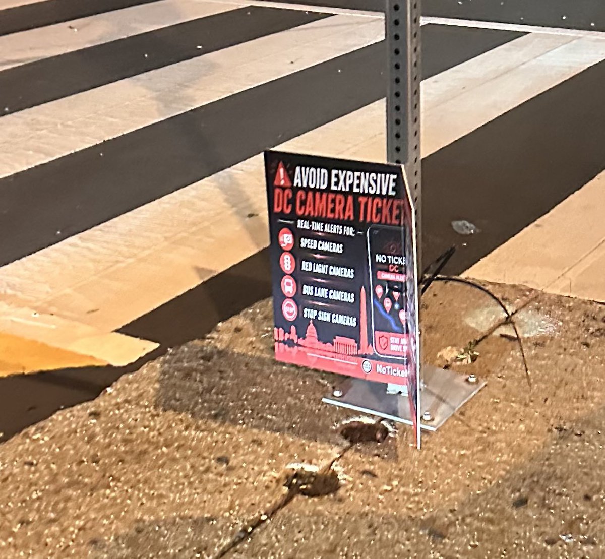 TheDMVLive's tweet photo. Posters for a new app that notifies users of stop sign, speed, bus lane, and other traffic control cameras in Washington DC spotted in Union Market 👀 https://t.co/TDLVChe3Nm