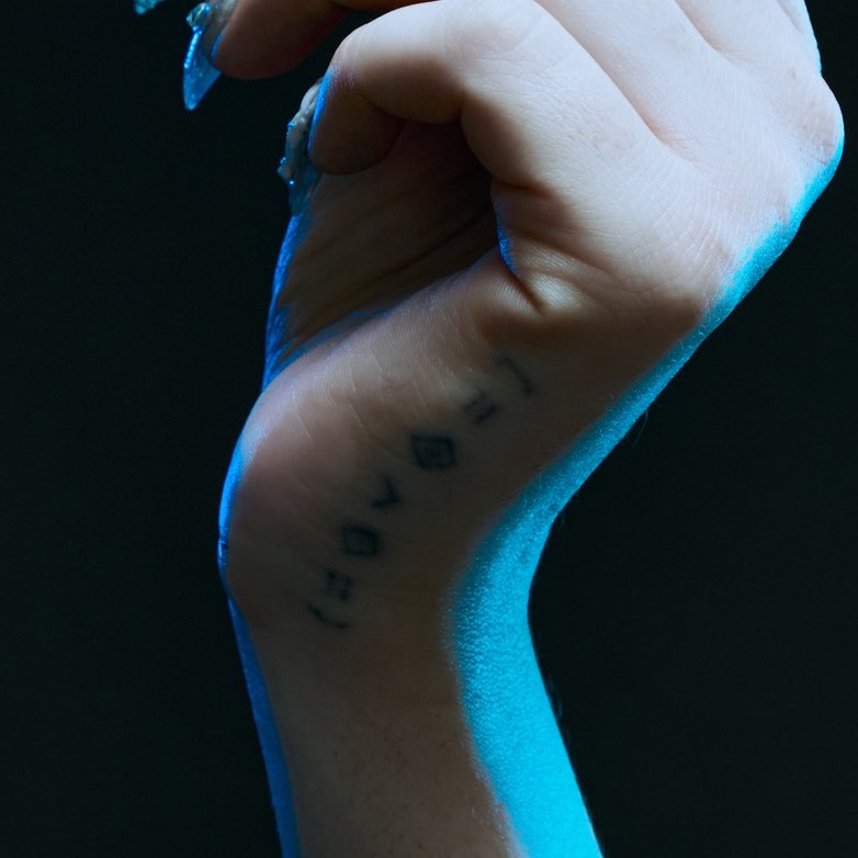 hatesthinking's tweet photo. nina’s worlds kaomoji tattoo omg 🥹 https://t.co/GzogImOa5c