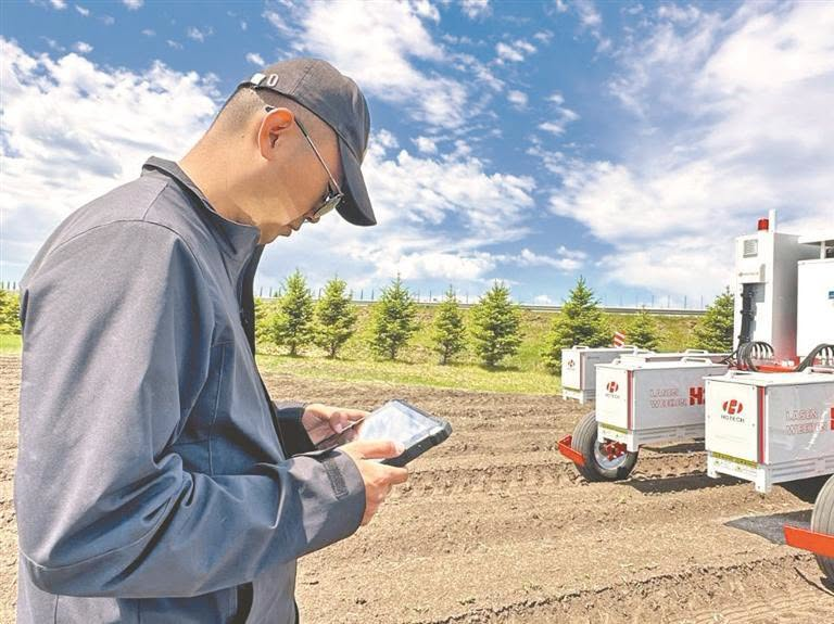 PDChina's tweet photo. AI laser weeder transforms soybean farming in Heilongjiang

Weed control has long been one of the biggest challenges for farmers. More than a dozen species compete with soybean crops, requiring three or four rounds of weeding each season. In the past, a farmworker could clear just 1 mu (0.067 hectares) a day, at a labor cost of around 200 yuan ($30).

This year, the AI-powered laser weeders entered large-scale commercial use. 

Equipped with high-definition cameras and a high-performance edge computing platform, the system scans plants more than 1,000 times every second. Within milliseconds, the AI model distinguishes crops from weeds, keeping crop damage below 0.1%. Now, a single machine can weed nearly 100 mu a day, almost 100 times the productivity of manual labor. 

Read update: https://t.co/fkpTTualuI