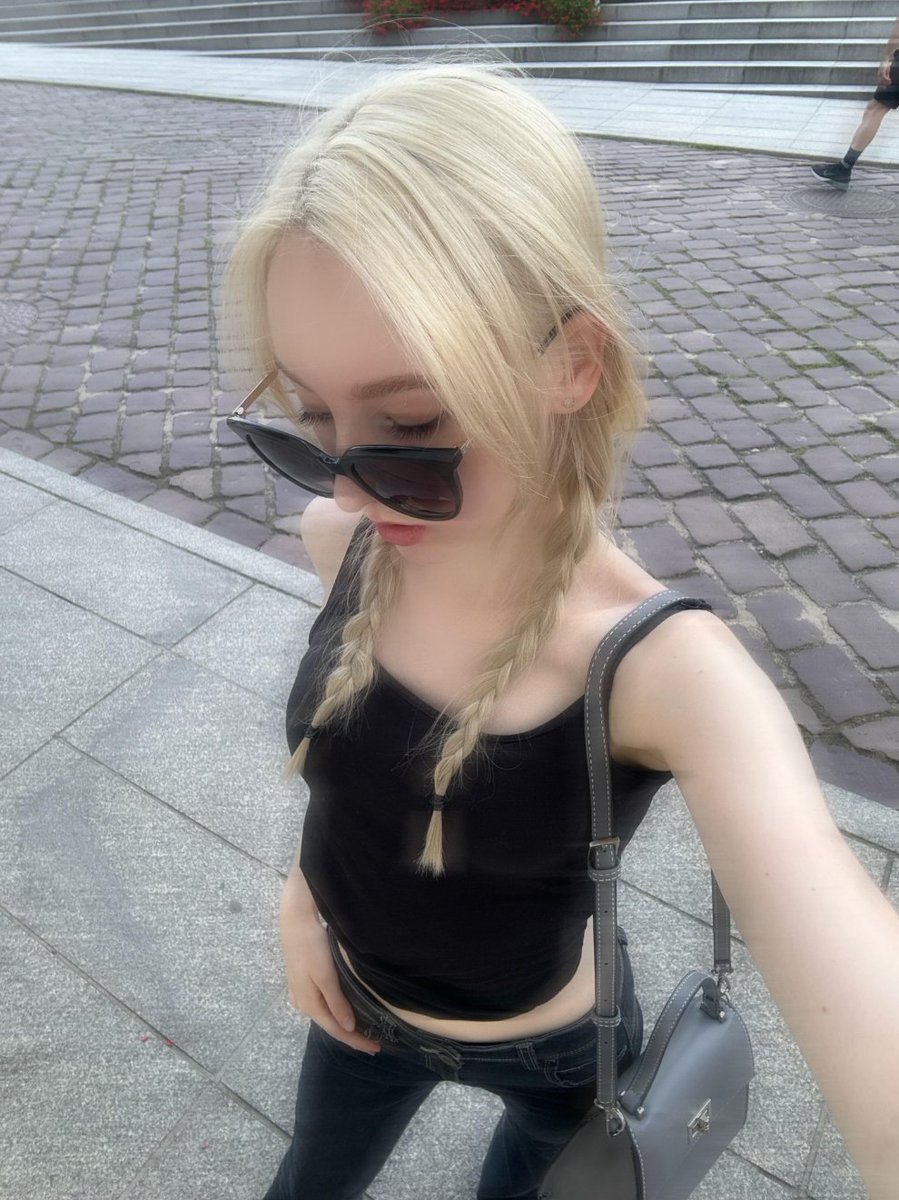 SilentHaltca0's tweet photo. Black tank, double braids, strolling old town streets. Sunglasses on, everything settles. Old walls, cobblestones, passing shadows as background. No need to pose, shots come as I walk. Black fits carry quiet coolness, clear lines, not disturbing, not disturbed 🖤 https://t.co/esBzUTcktw