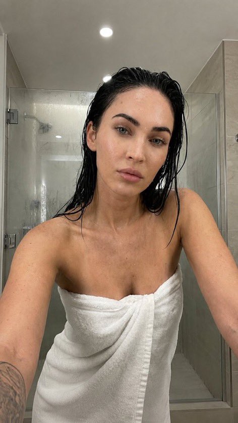 wiliam_web3's tweet photo. A shower before dinner!😉🚿

Scarlett Johansson, Megan Fox, Sydney Sweeney, Sadie Sink

Nano banana prompt :

{
  "type": "image_prompt",
  "version": "1.0",

  "description": {
    "subject": {
      "identity": "Use uploaded reference face exactly",

      "appearance": {
        "face": "Ultra realistic woman with natural wet skin texture after shower, visible water droplets on forehead, cheeks, shoulders and collarbone, realistic skin pores, soft neutral expression, natural glossy lips, minimal makeup look, authentic damp skin reflections",

        "hair": "Wet hair slicked back naturally with damp strands framing face and neck, realistic moisture texture and shine",

        "body": "Slim feminine physique with realistic anatomy and natural proportions"
      }
    },

    "clothing": {
      "outfit": {
        "details": [
          "Soft white luxury bath towel wrapped around body",
          "Realistic fluffy towel fabric texture",
          "Natural towel folds and wrapped styling",
          "Fresh post-shower appearance"
        ]
      }
    },

    "pose": {
      "details": [
        "Close-up selfie style framing",
        "Upper body leaning slightly forward toward camera",
        "Both arms extended naturally as if holding phone",
        "Head tilted slightly downward and toward camera",
        "Relaxed shoulders",
        "Soft tired expression after shower",
        "Natural candid bathroom moment"
      ]
    },

    "environment": {
      "location": "Modern luxury bathroom",

      "background": [
        "Large glass shower enclosure with light steam condensation",
        "Soft beige marble bathroom walls",
        "Minimal modern bathroom interior",
        "Subtle water marks on shower glass",
        "Clean luxury hotel-style bathroom atmosphere",
        "Bright neutral bathroom tones",
        "Elegant contemporary design"
      ]
    },

    "lighting": {
      "type": "Ultra realistic soft bathroom lighting",

      "effects": [
        "Bright diffused overhead bathroom lights",
        "Soft reflections on wet skin",
        "Natural moisture highlights on forehead and shoulders",
        "Balanced warm-neutral indoor tones",
        "Realistic bathroom ambience",
        "Gentle shadows around jawline and collarbone",
        "Natural skin color rendering",
        "Authentic post-shower glow",
        "Professional candid beauty photography lighting"
      ]
    },

    "camera": {
      "angle": "Close eye-level selfie perspective",

      "framing": "Upper-body vertical composition",

      "focus": "Sharp focus on face and wet skin texture with softly blurred bathroom background",

      "style": "Ultra realistic candid beauty photography"
    },

    "watermark": {
      "details": [
        "Small subtle watermark text 'Glena jenner'",
        "Placed discreetly in bottom corner",
        "Very low opacity elegant font",
        "Does not distract from composition"
      ]
    },

    "quality": {
      "render": "Ultra photorealistic 8k",

      "details": [
        "Hyper realistic wet skin texture",
        "Detailed water droplets",
        "Natural facial details",
        "Realistic bathroom reflections",
        "Authentic lighting and shadows",
        "Professional editorial beauty quality",
        "Ultra detailed towel fabric",
        "True-to-life skin tones",
        "Luxury bathroom atmosphere"
      ]
    }
  }
}