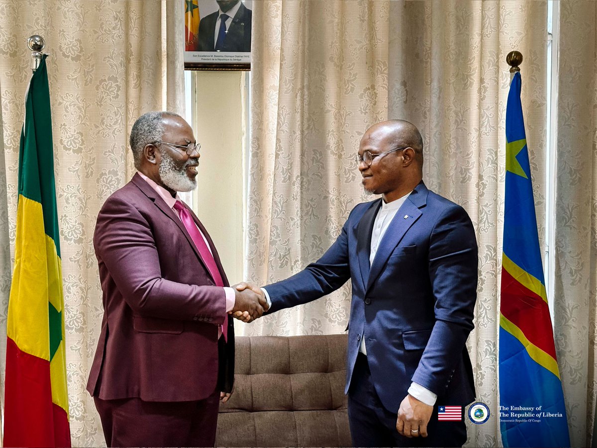 EmbLiberiaDRC's tweet photo. 🇱🇷🇸🇳 Dans le cadre du renforcement continu de sa diplomatie de réseau à Kinshasa, le Chef de Mission de l’Ambassade du Libéria, Son Excellence Dr Da Monynson Tarr, a effectué une visite de courtoisie à l’Ambassade de la République du Sénégal, où il a été reçu en audience par Son Excellence Abdoulaye Bathily, Ambassadeur Extraordinaire et Plénipotentiaire. Cette rencontre solennelle a permis de célébrer la profondeur des liens historiques et la fraternité indéfectible qui unissent Monrovia et Dakar.

Au cœur de leurs échanges, les deux diplomates ont réaffirmé l'importance d'une coordination stratégique au sein de la CEDEAO/ECOWAS, en mettant un accent particulier sur la stabilité sous-régionale et la protection active de leurs ressortissants évoluant dans des secteurs clés ou des zones complexes. Les discussions ont également porté sur l'expansion de partenariats bilatéraux dynamiques dans l'éducation, la santé, le sport et le tourisme, tout en soulignant la volonté du Libéria de s'inspirer de l'expertise sénégalaise dans la tenue des grandes biennales artistiques panafricaines.

L’Ambassade du Libéria adresse ses plus vifs remerciements à Son Excellence Abdoulaye Bathily pour la chaleur de cet accueil fraternel lors de cette visite de courtoisie, réaffirmant son engagement indéfectible à consolider la solidarité ouest-africaine et la coopération inter-institutionnelle à Kinshasa.
_______

🇱🇷🇸🇳 As part of its active network diplomacy in Kinshasa, Liberia's Head of Mission, H.E. Dr. Da Monynson Tarr, paid a courtesy visit to the Embassy of the Republic of Senegal, where he was received in an official audience by H.E. Abdoulaye Bathily, Ambassador Extraordinary and Plenipotentiary. This high-level meeting highlighted the deep historical ties and enduring brotherhood uniting Monrovia and Dakar.

During their discussions, both diplomats emphasized key strategic priorities, including enhanced coordination within ECOWAS/CEDEAO to address sub-regional security challenges and safeguard the welfare of their citizens. They also explored multi-sectoral cooperation across education, health, sports, tourism, and culture, noting Liberia's keen interest in leveraging Senegal's renowned leadership in organizing major Pan-African artistic biennials.

The Embassy of Liberia expresses its profound gratitude to H.E. Abdoulaye Bathily for the warm and fraternal reception during this courtesy visit, marking another vital milestone in advancing West African diplomatic synergy and Pan-African solidarity in Kinshasa.

#Diplomacy #Liberia #Senegal #Kinshasa #DRC #ECOWAS #CEDEAO #WestAfrica #BilateralRelations #CultureAndArts #NetworkDiplomacy