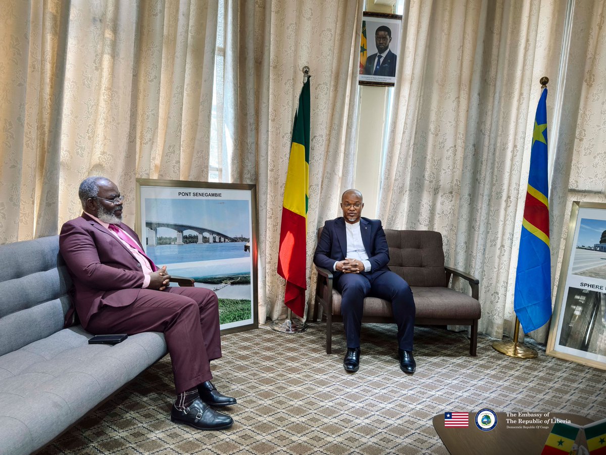 EmbLiberiaDRC's tweet photo. 🇱🇷🇸🇳 Dans le cadre du renforcement continu de sa diplomatie de réseau à Kinshasa, le Chef de Mission de l’Ambassade du Libéria, Son Excellence Dr Da Monynson Tarr, a effectué une visite de courtoisie à l’Ambassade de la République du Sénégal, où il a été reçu en audience par Son Excellence Abdoulaye Bathily, Ambassadeur Extraordinaire et Plénipotentiaire. Cette rencontre solennelle a permis de célébrer la profondeur des liens historiques et la fraternité indéfectible qui unissent Monrovia et Dakar.

Au cœur de leurs échanges, les deux diplomates ont réaffirmé l'importance d'une coordination stratégique au sein de la CEDEAO/ECOWAS, en mettant un accent particulier sur la stabilité sous-régionale et la protection active de leurs ressortissants évoluant dans des secteurs clés ou des zones complexes. Les discussions ont également porté sur l'expansion de partenariats bilatéraux dynamiques dans l'éducation, la santé, le sport et le tourisme, tout en soulignant la volonté du Libéria de s'inspirer de l'expertise sénégalaise dans la tenue des grandes biennales artistiques panafricaines.

L’Ambassade du Libéria adresse ses plus vifs remerciements à Son Excellence Abdoulaye Bathily pour la chaleur de cet accueil fraternel lors de cette visite de courtoisie, réaffirmant son engagement indéfectible à consolider la solidarité ouest-africaine et la coopération inter-institutionnelle à Kinshasa.
_______

🇱🇷🇸🇳 As part of its active network diplomacy in Kinshasa, Liberia's Head of Mission, H.E. Dr. Da Monynson Tarr, paid a courtesy visit to the Embassy of the Republic of Senegal, where he was received in an official audience by H.E. Abdoulaye Bathily, Ambassador Extraordinary and Plenipotentiary. This high-level meeting highlighted the deep historical ties and enduring brotherhood uniting Monrovia and Dakar.

During their discussions, both diplomats emphasized key strategic priorities, including enhanced coordination within ECOWAS/CEDEAO to address sub-regional security challenges and safeguard the welfare of their citizens. They also explored multi-sectoral cooperation across education, health, sports, tourism, and culture, noting Liberia's keen interest in leveraging Senegal's renowned leadership in organizing major Pan-African artistic biennials.

The Embassy of Liberia expresses its profound gratitude to H.E. Abdoulaye Bathily for the warm and fraternal reception during this courtesy visit, marking another vital milestone in advancing West African diplomatic synergy and Pan-African solidarity in Kinshasa.

#Diplomacy #Liberia #Senegal #Kinshasa #DRC #ECOWAS #CEDEAO #WestAfrica #BilateralRelations #CultureAndArts #NetworkDiplomacy