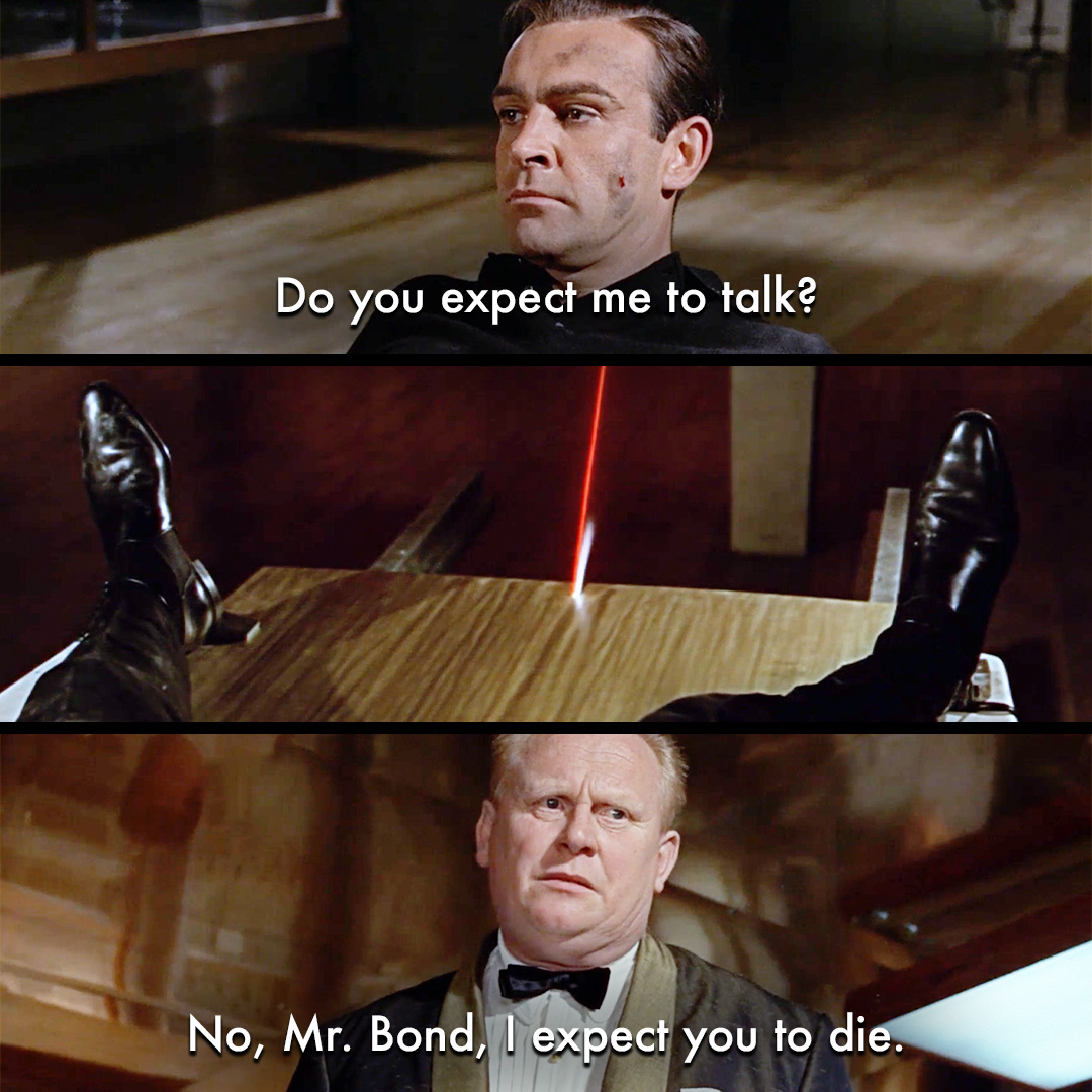 007's tweet photo. “They brought a real laser in, which looked great. It had a pencil-thin line, but as soon as you turn all the studio lights on, it disappeared. So John Stears and his team made up this fake one, and we optically put the laser beam on afterwards.” – Cliff Culley, Special Effects Supervisor.

Bond (Sean Connery) faces Goldfinger’s (Gert Fröbe) deadly laser in GOLDFINGER.
