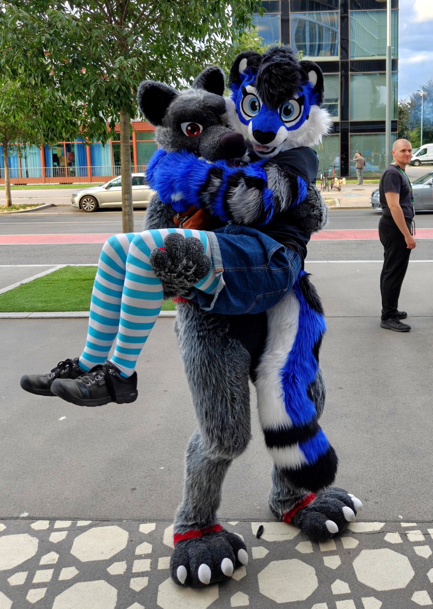 littlepawsnep's tweet photo. Getting carried by this big bad wolf at #awoostria 😖🥰

🐺 @ZleekWolf

#fursuitfriday #FursuitEverday #furry #awoostria2026 https://t.co/xfVs2IJsyX
