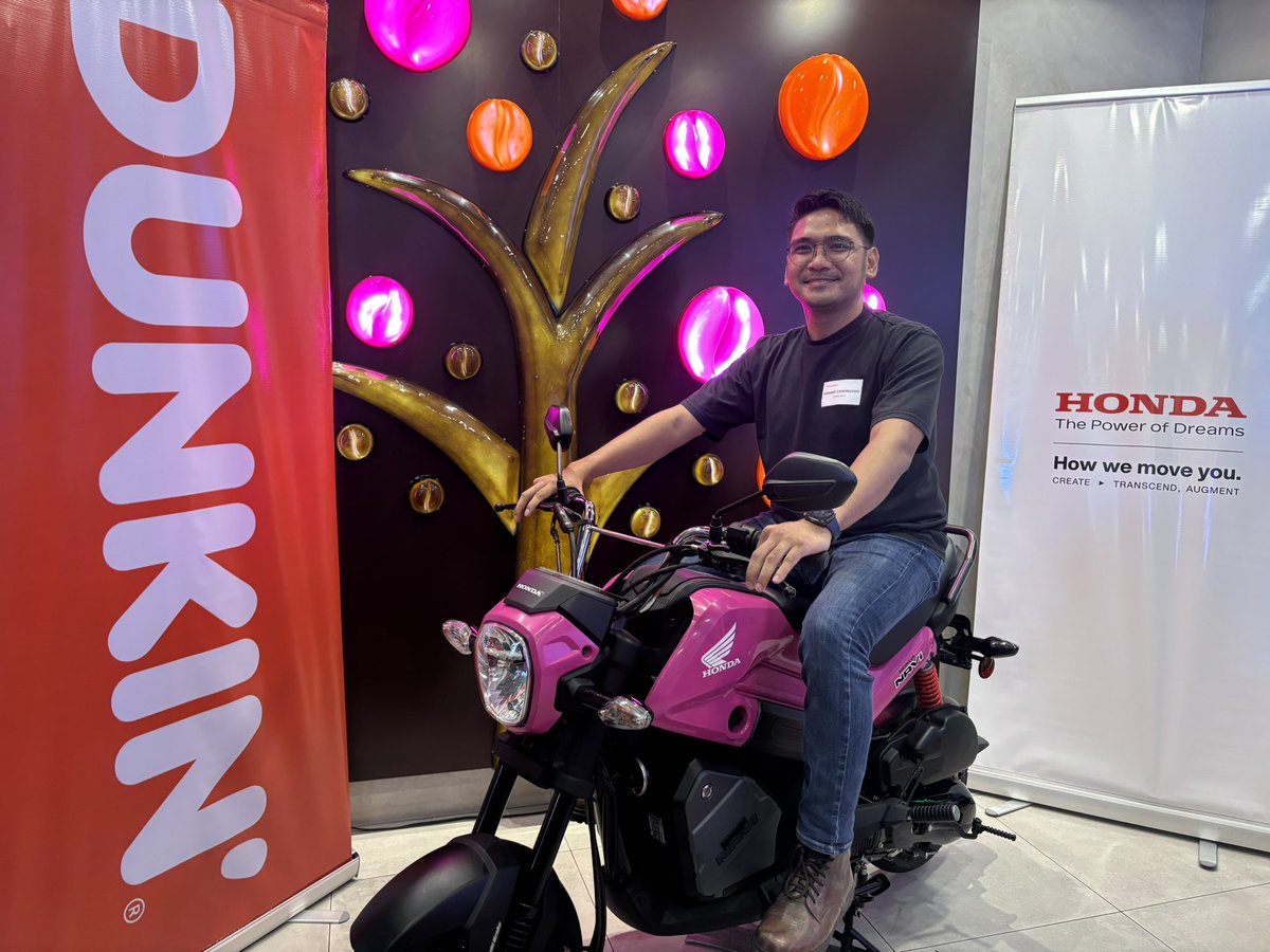 dunkinph's tweet photo. Dunkin’ PH and Honda are teaming up to make every new ride even sweeter! 🏍️🍩

Customers who purchase a Honda NAVi will bring home a Dunkin’ voucher for 8 Classic Donuts! Available at participating stores nationwide. Promo runs until October 27, 2026. 

#DunkinPHxHonda #PasalubongNgBayan