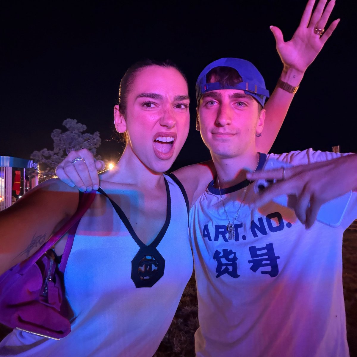 DUALIPA's tweet photo. WE ARE SO BACK!!!! 🇽🇰🇽🇰🇽🇰🇽🇰🇽🇰🇽🇰🇽🇰 I can't believe we're about to kick off our 7th edition of @2026sunnyhill !!!!!! 🥲💙💛 

Went down to the festival site last night to see everything before it all kicks off today, and I'm absolutely buzzing with excitement +++ feeling so incredibly proud of our family and the whole team for everything that's gone into making this happen!!!!

And to make yesterday even more magical... I became a godmother 🧚🏻‍♀️ 🧚🏻 

Safe to say the tears have been flowing all day... SEE YOU TONIGHT, PRISHTINA!!!!! @2026sunnyhill ⭐️⭐️⭐️⭐️⭐️⭐️⭐️⭐️⭐️