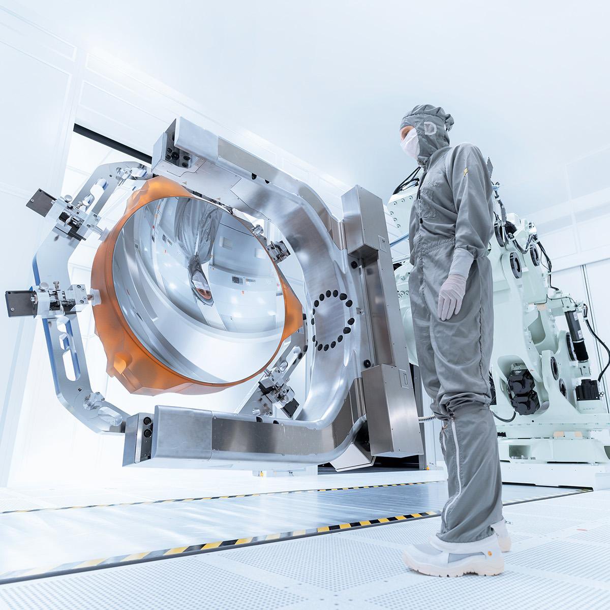Object_Zero_'s tweet photo. High NA-EUV Lithography 

Zeiss is beginning production of their High NA-EUV systems for ASML.

“High NA” means high numerical aperture, which is a measure of the angular range from which an optical system can pick up light. For context High NA has numerical aperture of 0.55, whereas current EUV NA is 0.33

A 66% improvement.

That’s a feature density improvement of 1.67^2=2.789 so a near tripling of transistor density per unit area. It brings the critical dimension down to 8nm from 13nm.

Q: How did Zeiss achieve this?
A: With great difficulty.

• The projection optics system is 40,000 parts and around 12 tonnes.

• The illumination system is 25,000 parts and is 6 tonnes.

• The machine that manufacturers these mirrors is based in Germany, and consists of 100,000 parts and is 150 tonnes, the machining chamber itself is a 5m x 5m x 10m vacuum chamber.

The mirrors are machined for 3 months[!] to achieve a precision equivalent to 1mm deviation over an area the size of the Pacific Ocean.

It’s worth noting here that theoretical maximum NA = 1.0

Hyper NA (>0.7 and achieved using 8 mirrors) is expected the enter production 2032 - 2035.

That brings the critical dimension down to around 6nm and that might be the end, a single silicon atom is 0.23nm so the precision would be +/- 24 atoms.

Fun note… there is a category of lathes and machine tools called “ultra-precision” and these have axis resolutions of 1-2nm and can produce contoured shapes to 25nm accuracy. 

You can buy “ultra-precision” machines, grinding machines for optical equipment have incredibly precise axis control because surface asperity on a mirror is visible to the eye.

B23B is the IPC/CPC class, and it teaches some interesting niche stuff (tells you where the future is going, even with trade secrets omitted).