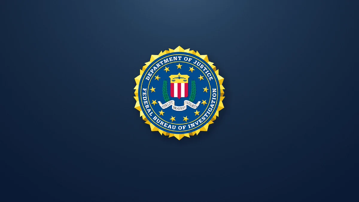 The FBI Seal is depicted on a dark blue background.
