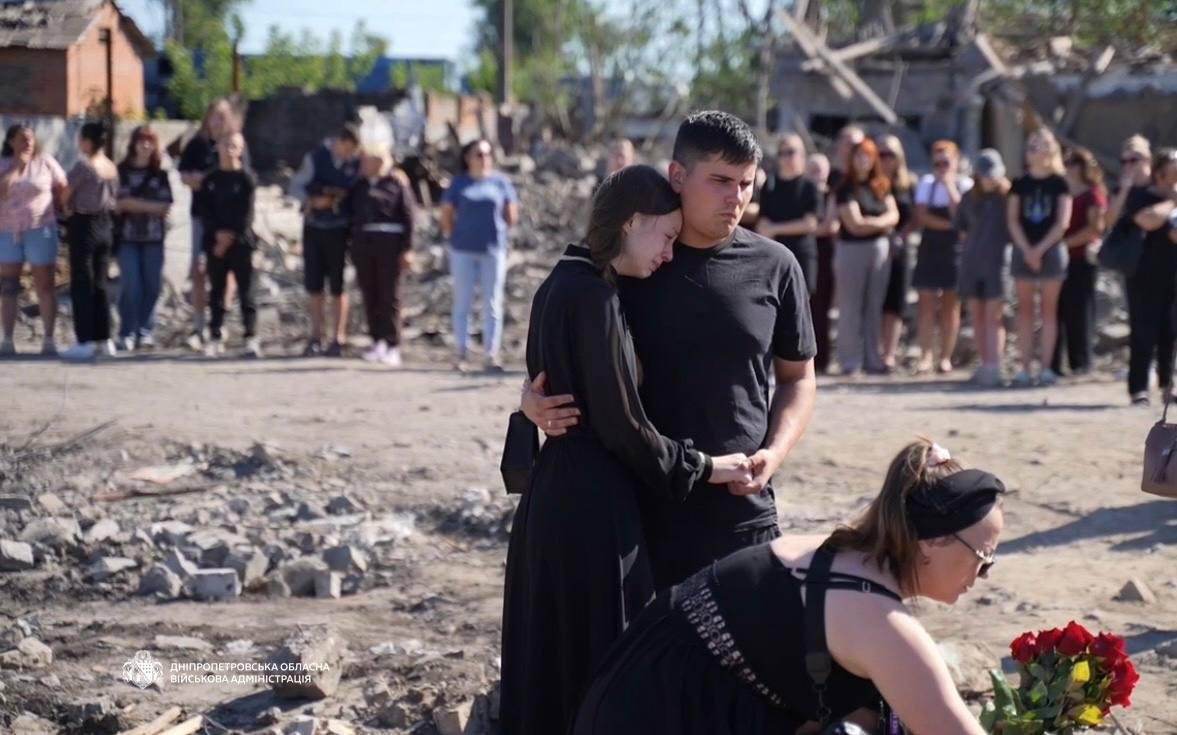 BohuslavskaKate's tweet photo. 🕯 In the village of Radushne, residents gathered to honor the memory of the Voronov family, killed by Russia.

Russian ballistic missile struck the home of a large family during Russia’s massive attack on Ukraine on July 30. 

Once again, a ballistic missile struck a home. All 10 of them are gone now. Their only crime was being Ukrainian in their own home.