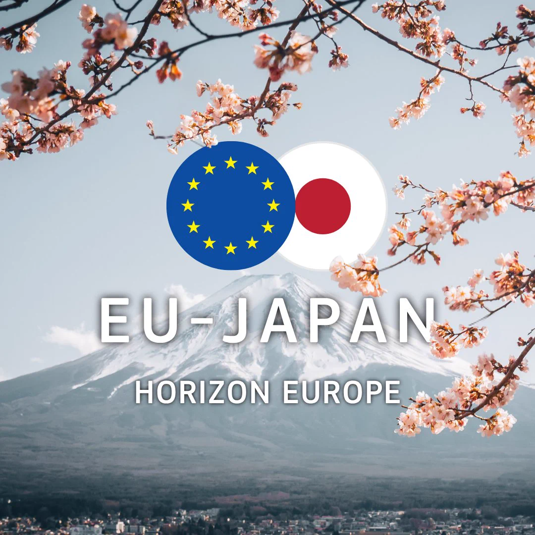 Visual featuring Mount Fuji framed by pink cherry blossoms. At the centre are the overlapping flags of the European Union and Japan, with the text "EU-JAPAN HORIZON EUROPE" overlaid below. 