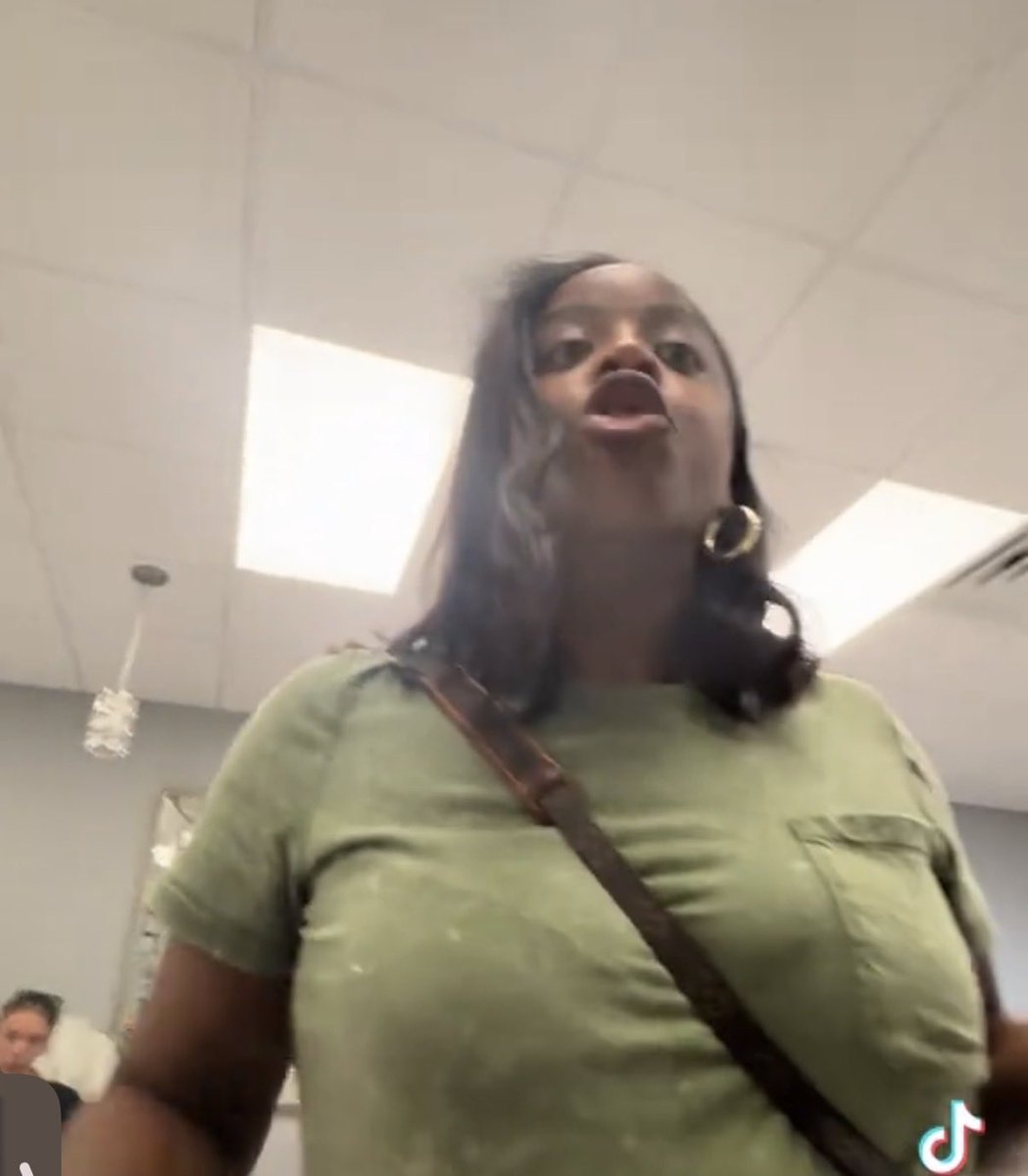 EBTtok's tweet photo. A White lady records a black woman crashing out at the Nail salon, and proceeds to troll her into an apparent arrest😂 This lady is hilarious. 

Cuticleisha doesn’t like being recorded, tries to attack the white customer when she won’t stop. Zero emotional control, as usual. https://t.co/uy6KKtwLLM