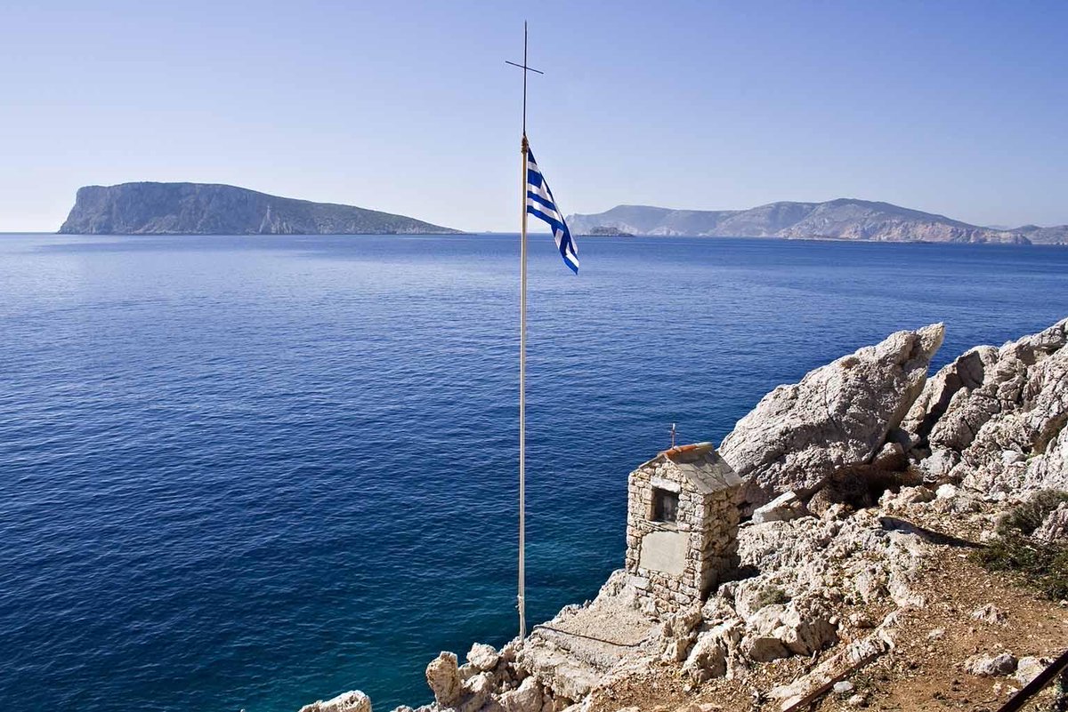 georgioslidis's tweet photo. 🇬🇷 The Lady of Ro 🇬🇷

Not every hero carried a rifle.

Some carried a flag.

On the tiny, windswept islet of Ro, where the Aegean meets the horizon, Despina Achladiotou stood alone for decades.

Every morning she raised the Greek flag.

Every evening she lowered it.
No matter the storm.
No matter the wind.
No matter the loneliness.

She asked for no recognition.

She simply believed that even the smallest corner of Greece deserved to greet each sunrise beneath its flag.

When she passed away in 1982, she was buried with full military honors on the island she had loved and guarded.

Today, Greek soldiers continue the tradition she began.

Some people defend a nation with words.
Some with weapons.

She defended it with unwavering devotion one sunrise at a time.

“One Woman. One Flag. One Lifetime of Devotion.”

“She never asked if the weather was fair. She simply raised the flag.”

Some heroes never fired a shot.
They simply refused to let the flag fall.

For decades, Despina Achladiotou — the Lady of Ro — raised the Greek flag every sunrise and lowered it every sunset on the tiny island of Ro, through storms, solitude, and the passing of time.

Today, Greek soldiers continue the tradition she began.

Sources:
Greek Ministry of National Defence (Hellenic Armed Forces tradition)

eKathimerini – The Lady of Ro’s Memory Lives On

Greece Is – Who Was the Lady of Ro? 

Αἰωνία ἡ μνήμη της. 🇬🇷