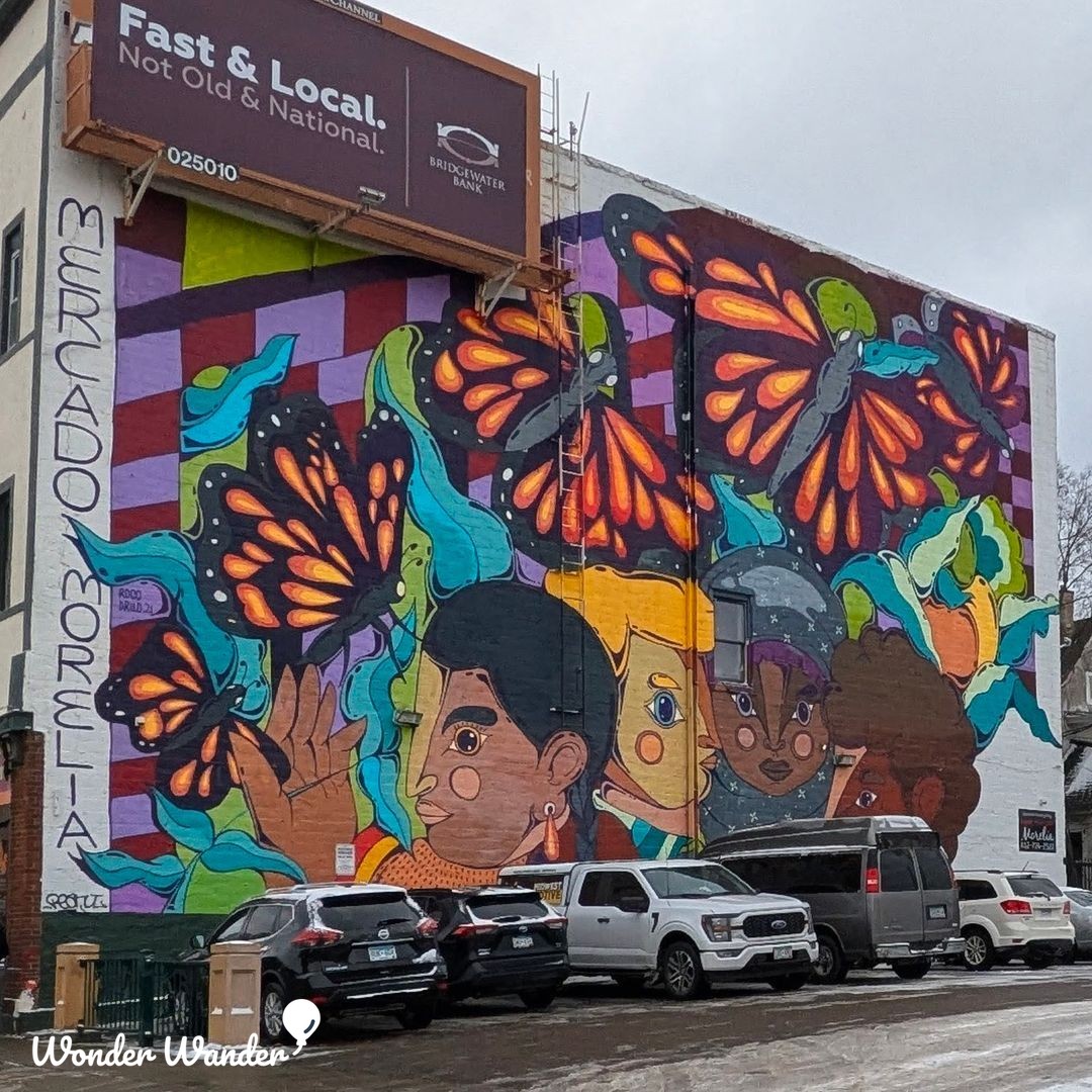 WonderwanderArt's tweet photo. A three-story burst of color on Lake Street in Minneapolis. Butterflies, playful birds, and glowing figures cover the Mercado mural by Rodrigo Oñate. This building is celebrating. #PublicArt #Minneapolis #StreetArt https://t.co/aEWpu1UhZO https://t.co/dCtgFFmVMI