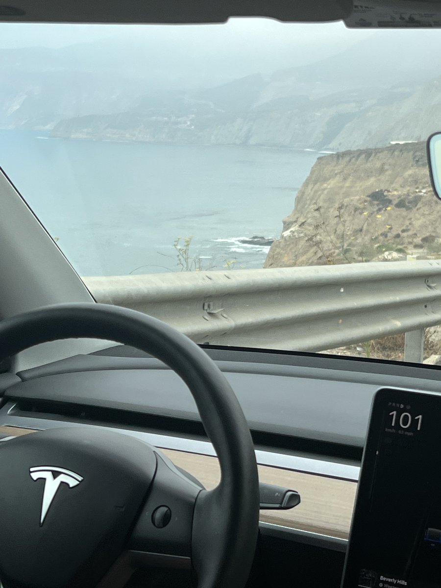 teslascope's tweet photo. Enjoying a brief trip along the Baja California coast in a friend’s Model Y.

While in the car, I used @cursor_ai +
Grok 4.5 to develop an iOS app for managing the service while on the go.

Even on vacation, all I can think of is work! https://t.co/O8WrUM0vYO