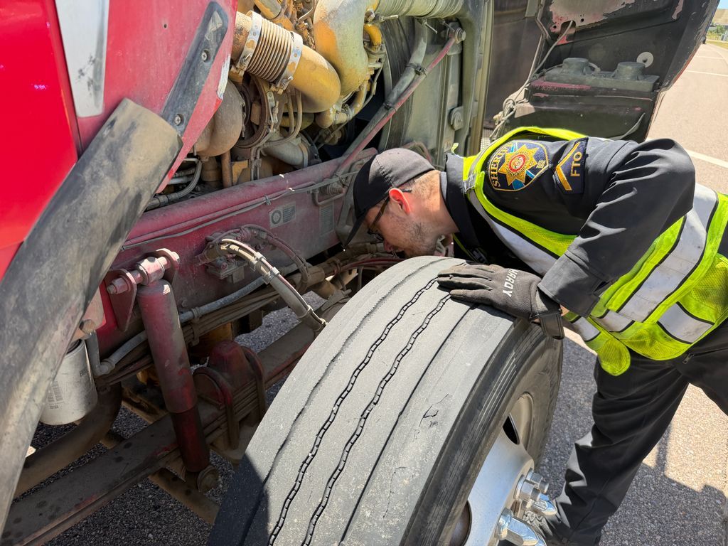 dcsheriff's tweet photo. Under the Rig: DCSO Inspects Commercial Trucks 

On Thursday, the Douglas County Sheriff's Office teamed up with the Colorado State Patrol Monument Port of Entry Mobile Scales to conduct a Commercial Motor Vehicle checkpoint on Chambers Road, just south of Mainstreet.

The goal of these mobile checkpoints is to ensure large trucks on our roads are operating safely and following the law. Here are the final numbers from the operation:

🔹 63 Total trucks stopped
🔹 32 Full inspections conducted
🔹 50 Total violations found
🔹 7 Drivers placed Out of Service
🔹 5 Vehicles placed Out of Service
🔹 8 Tickets issued
🔹 6 Commercial driver's license (CDL) violations
🔹 4 Seat belt violations
🔹 2 Drug or alcohol violations
🔹 1 License suspension
🔹 1 Proof of service served

A big thank you to our deputies and CSP for keeping our roadways safe for everyone!