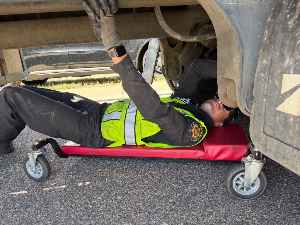 dcsheriff's tweet photo. Under the Rig: DCSO Inspects Commercial Trucks 

On Thursday, the Douglas County Sheriff's Office teamed up with the Colorado State Patrol Monument Port of Entry Mobile Scales to conduct a Commercial Motor Vehicle checkpoint on Chambers Road, just south of Mainstreet.

The goal of these mobile checkpoints is to ensure large trucks on our roads are operating safely and following the law. Here are the final numbers from the operation:

🔹 63 Total trucks stopped
🔹 32 Full inspections conducted
🔹 50 Total violations found
🔹 7 Drivers placed Out of Service
🔹 5 Vehicles placed Out of Service
🔹 8 Tickets issued
🔹 6 Commercial driver's license (CDL) violations
🔹 4 Seat belt violations
🔹 2 Drug or alcohol violations
🔹 1 License suspension
🔹 1 Proof of service served

A big thank you to our deputies and CSP for keeping our roadways safe for everyone!