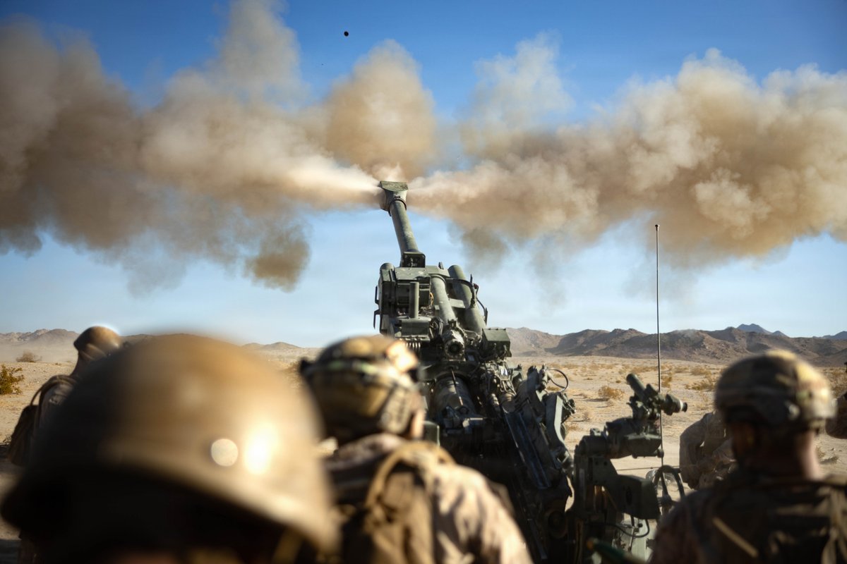 USMC's tweet photo. #Marines with the 1st Marine Division take part in a battery movement to contact exercise as part of Service Level Training Exercise 4-26 at @MCAGCC29Palms California. 

SLTE is a premier training event that ensures the Marine Corps remains a highly lethal, adaptable force capable of dominating the future multi-domain fight. 

#MarineCorps  #USMC #SemperFi #Military