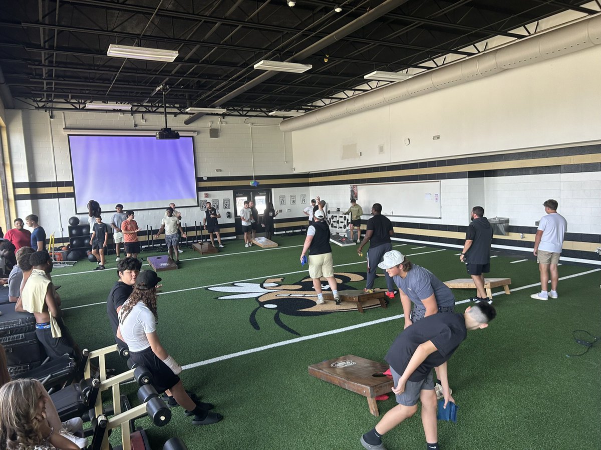 CoachFendley75's tweet photo. A lot of fun, football and team bonding at the Rock this evening. Dinner, Corn hole, funny skits and senior speeches. Great group of young men. Next week brings a football scrimmage to the Rock. #JacketNation https://t.co/71pTw7NZXj