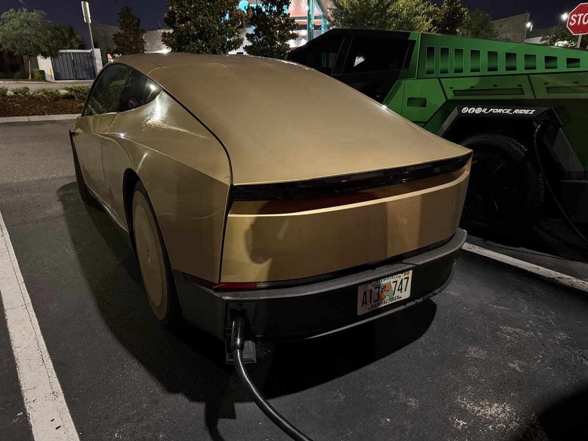 pedrot's tweet photo. Tesla Robotaxi with steering yoke spotted at Orlando Supercharger. #Tesla #Robotaxi https://t.co/xJuguucsZh