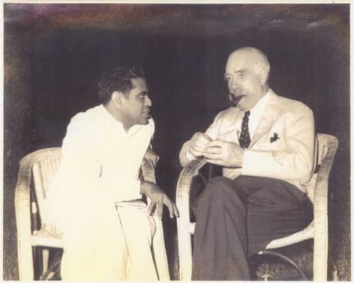 Fintech03's tweet photo. The Night Quantum Physics Almost Went Up in Flames (And Niels Bohr Did Not Care)!

In Jan 1960, Niels Bohr visited India as the personal guest of PM Nehru. Bhabha had planned Bohr’s schedule meticulously, keeping the giant of modern physics tightly aligned with official state research facilities. 

However, Alladi Ramakrishnan managed to invite Bohr & his wife Margrethe to dinner at Ekamra Nivas to meet his "stripling physicists". 

Bohr arrived at the Madras bungalow. What was supposed to be a polite, brief official courtesy call turned into an open-air physics session under the lawn's mango tree that lasted past midnight.  

As recorded in Ramakrishnan's memoirs (The Alladi Diary), a govt aide repeatedly reminded Bohr of his official bedtime at the Govt House, which Bohr completely ignored.  

Bohr got so deeply engrossed in debating quantum mechanics with the students that he absentmindedly tried to slip his still lit smoking pipe directly into his coat pocket, forcing his wife Margrethe to intervene to prevent the father of quantum theory from setting himself on fire.  

When Bohr arrived at the airport the next day for a press conference, journalists asked him what impressed him most in India. Bohr publicly praised 2 things:

- TIFR
- The informal theoretical physics seminars conducted on the lawn at Ekamra Nivas.  

When C. Subramaniam (the Finance Minister of Madras) saw Bohr's endorsement, he met with Ramakrishnan. Shortly after, Nehru himself met Ramakrishnan’s students at the Raj Bhavan in Madras.

In Jan 1962, this group was formally transformed into MATSCIENCE (The Institute of Mathematical Sciences), giving Southern India a world-class theoretical research institute.