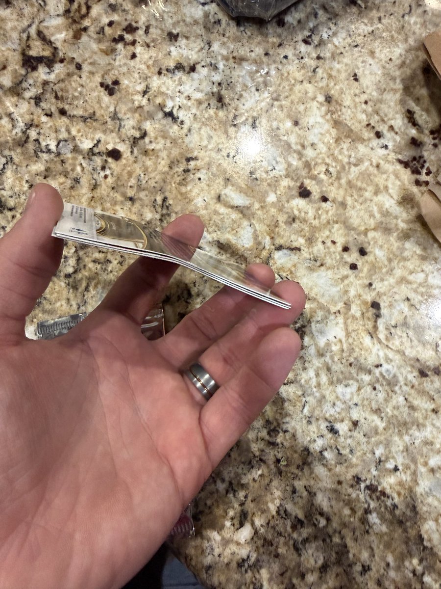 BrimhallDoug's tweet photo. @PaniniAmerica do you even care anymore?  I’ve never cashed in my reward points, I finally did, paid approximately $15 to ship it and this is what I get!   All bent to hell.   Thanks!   Appreciate you.  Anyone else have this experience?  @CardPurchaser https://t.co/uKBZgkC59r