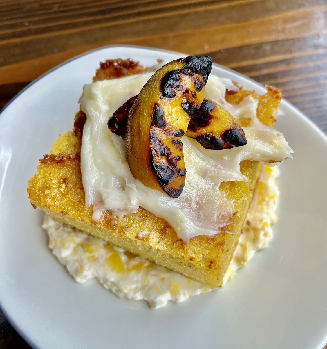 OldIrvingBeer's tweet photo. Dessert with beer

#weekendspecial = warm housemade cornbread w/ honey cream cheese frosting, peach purée, honey drizzle, &amp; grilled peaches https://t.co/DuE0sT42F9