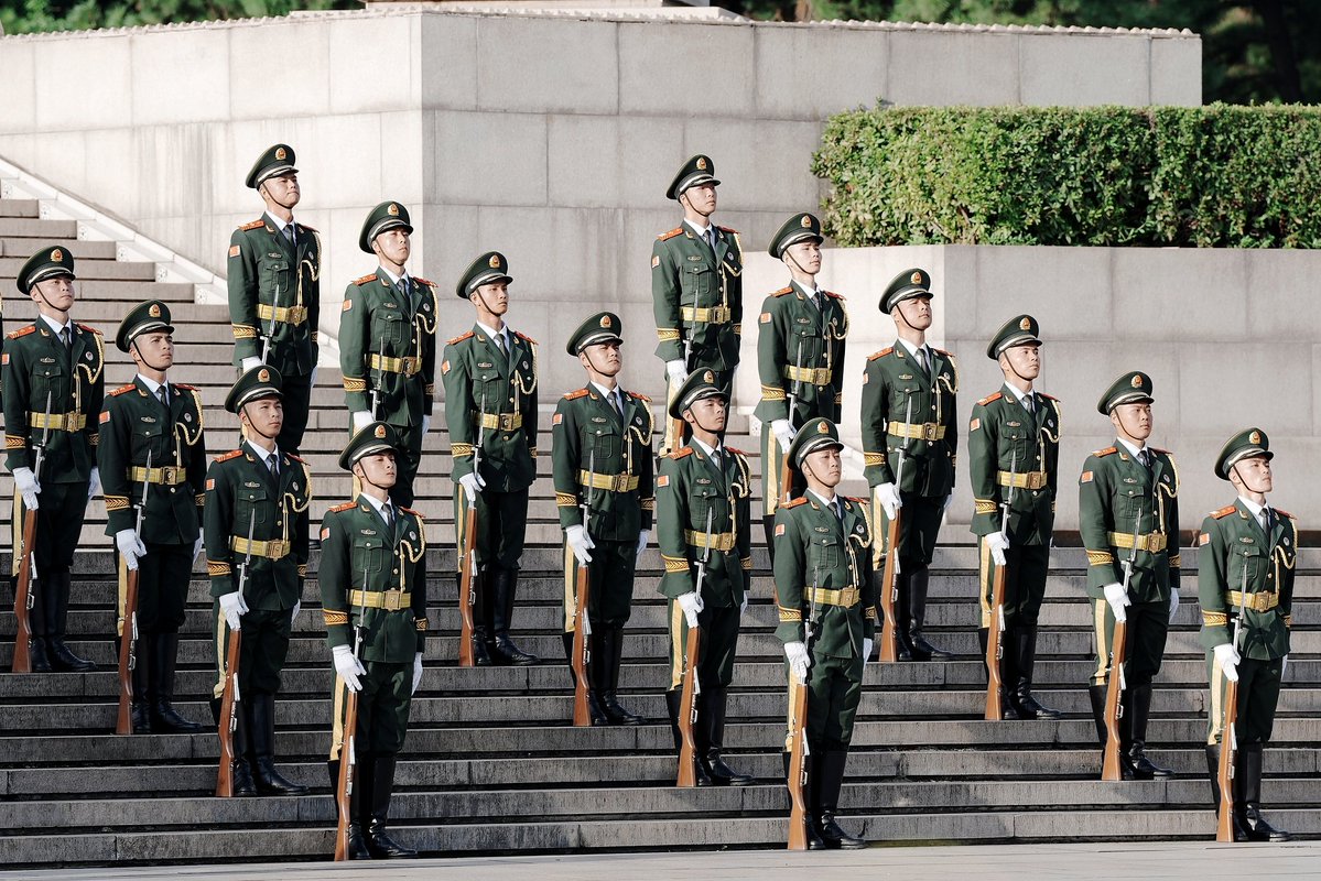 CGTNOfficial's tweet photo. Crowds gathered in Nanchang, birthplace of the Chinese People's Liberation Army (PLA), on August 1 for the national flag-raising ceremony as China marked the PLA's 99th founding anniversary. From the revolutionary era of fighting for national independence to the present day of peaceful development, the PLA has remained committed to safeguarding China's interests and its people. #ChinaSeen