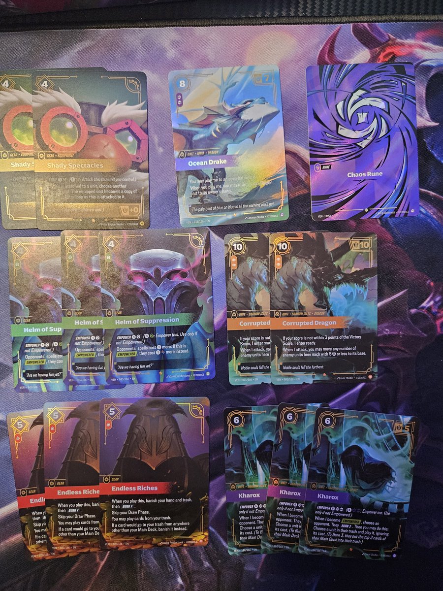QlippedWing's tweet photo. Opened a case on stream tonight and got some pretty good pulls! #riftbound #vendetta https://t.co/FyA1dmn34q