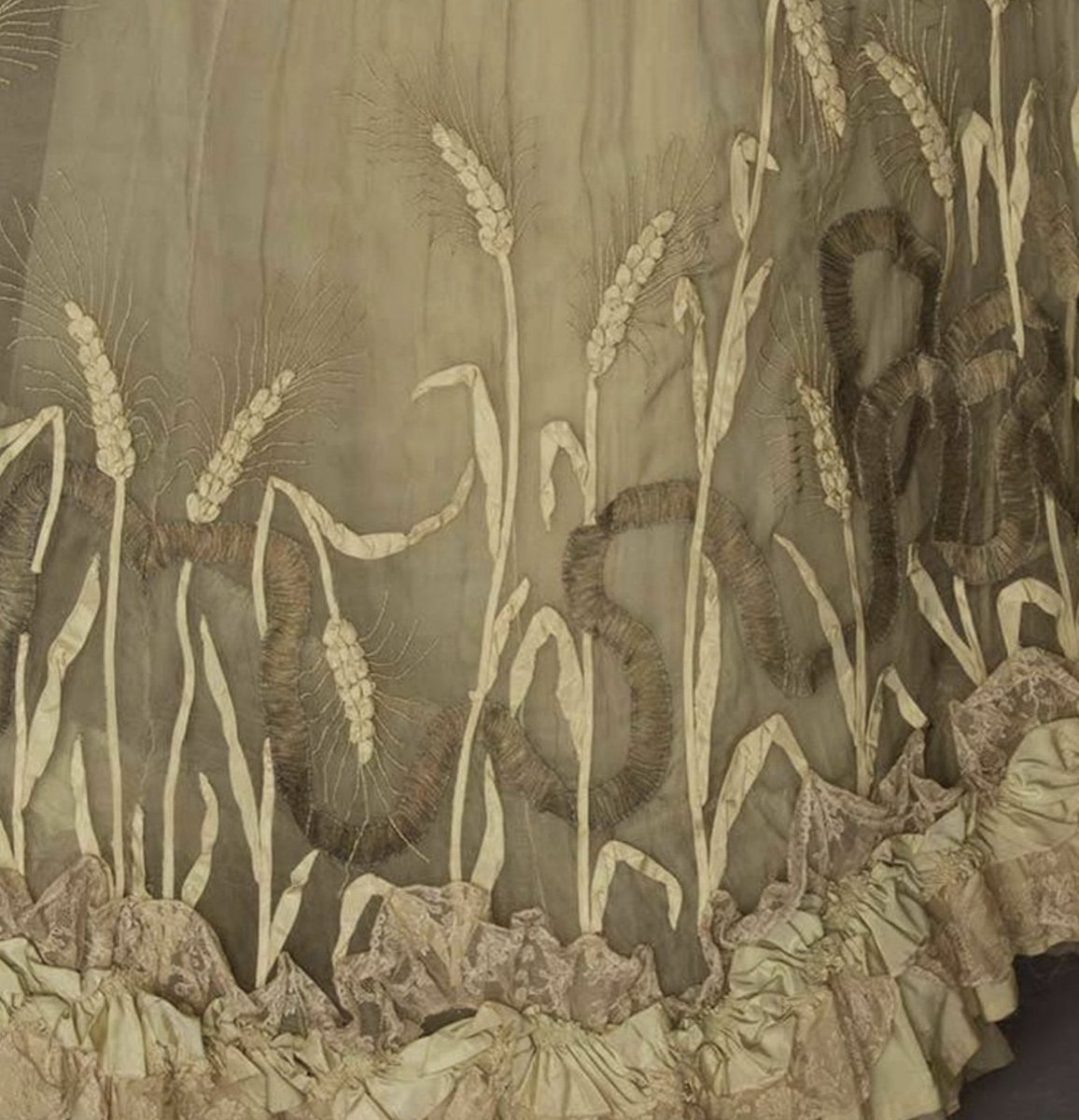 AnneLouiseAvery's tweet photo. A delicate Lammas dress from 1902 by Gustav Beer, richly decorated with silken wheat stalks, for drinking chouchen and telling fortunes in an old country garden, as a great golden moon rises in the dark Breton sky. https://t.co/TL4eKdLYDe