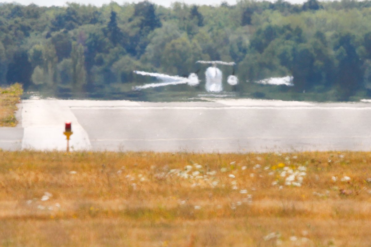 Spicey_Spiney's tweet photo. Yesterday I shared a couple of videos showing some awesome #mirages on the runway at @OxfordAirportUK Almost no views on the video, but here are some pics of a #DiamondDA42 reg: #GOATB after landing. It was so weird seeing its reflection then watching it disappear into the haze! https://t.co/Y9Ny7g7wjU