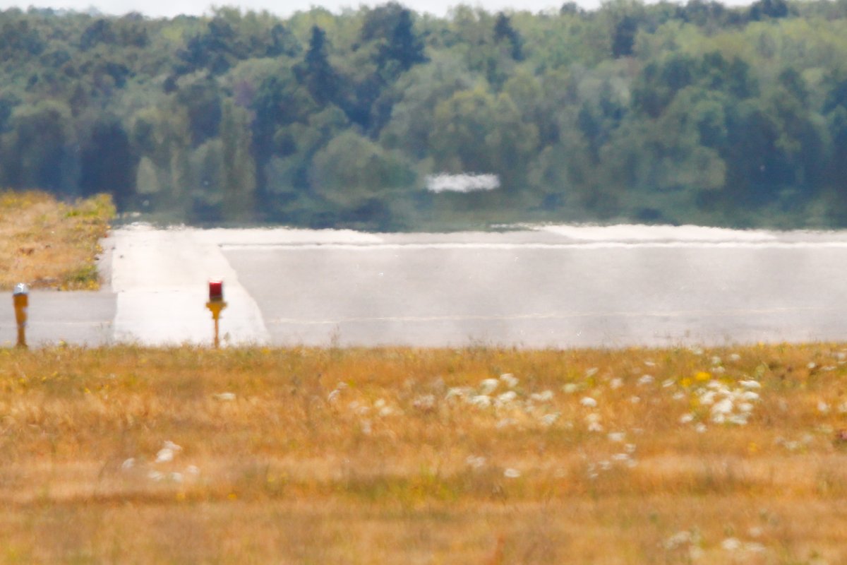 Spicey_Spiney's tweet photo. Yesterday I shared a couple of videos showing some awesome #mirages on the runway at @OxfordAirportUK Almost no views on the video, but here are some pics of a #DiamondDA42 reg: #GOATB after landing. It was so weird seeing its reflection then watching it disappear into the haze! https://t.co/Y9Ny7g7wjU