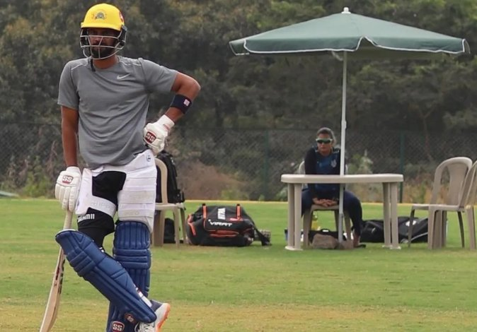 forRUTU31's tweet photo. This picture shows that ruturaj gaikwad isn't just practicing on the field, he is preparing for every challenge,
we can see him wearing the CSK's helmet and India's pads.
His wife is also sitting in the background. My bro is came for everything 🥹🙏

#csk #ipl27 #ruturajgaikwad https://t.co/YP7Rg5x2tR