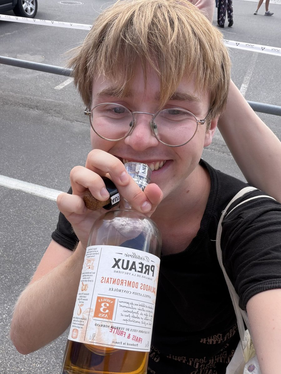 springbris's tweet photo. I’m sipping calvados in JPG at the pride parade I’m really him bro https://t.co/b27IdMZ5pj