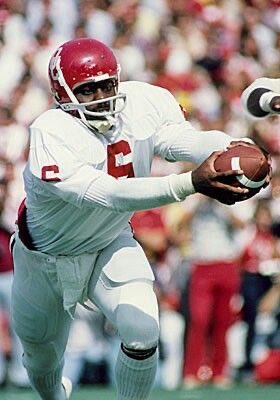 LarryInMissouri's tweet photo. Happy Birthday @ThomasLott_ out of San Antonio, Texas & @OU_Football 5’11 205; Thomas Lott cemented his legacy at @OU_Football as the first African American quarterback to start for the Sooners, serving as the masterful engine behind @Barry_Switzer iconic triple-option wishbone offense from 1976 to 1978. Widely recognized as one of the most electric, dangerous runners to ever play under center in Norman, @Barry_Switzer famously called him the “greatest wishbone quarterback in Oklahoma history.”—Beyond statistics, Lott left an indelible mark on college football culture. He popularized wearing a trademark bandana tied underneath his helmet. While it drew minor criticism at the time, it became a beloved symbol of flair, individuality, and confidence that defined Oklahoma’s swagger during the Switzer era. He paved the way for subsequent Black option-quarterback legends at OU, including J.C.Watts and Jamelle Holieway; 69 Today #BoomerSooner🅾️